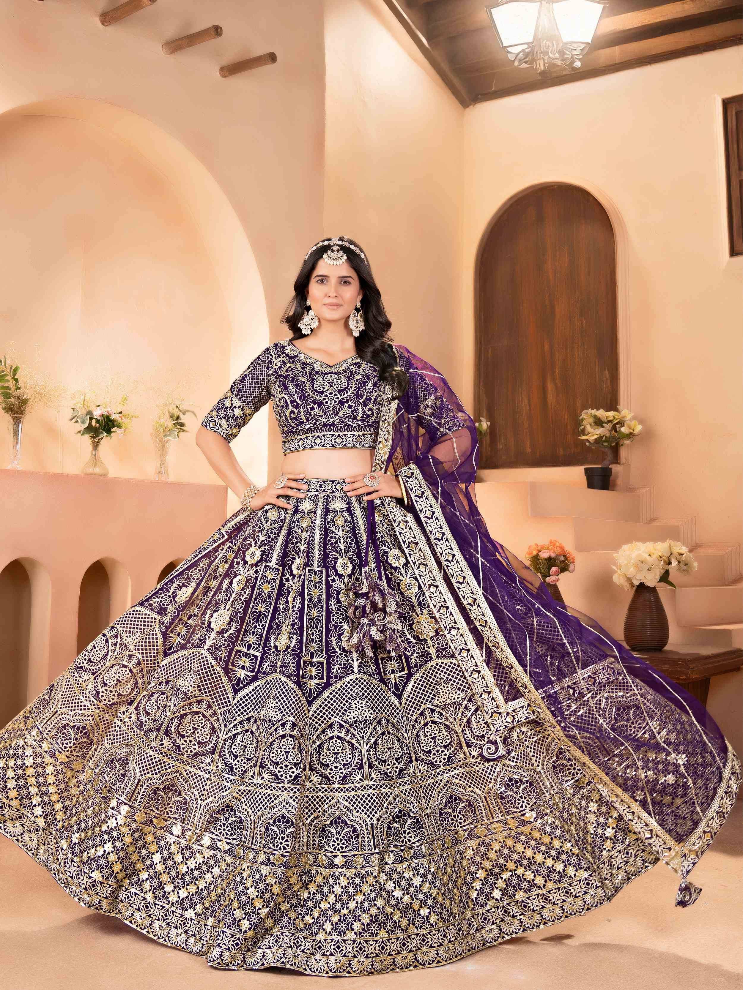 Enchanting Purple Zari Embroidered Net Reception Wear Lehenga Choli