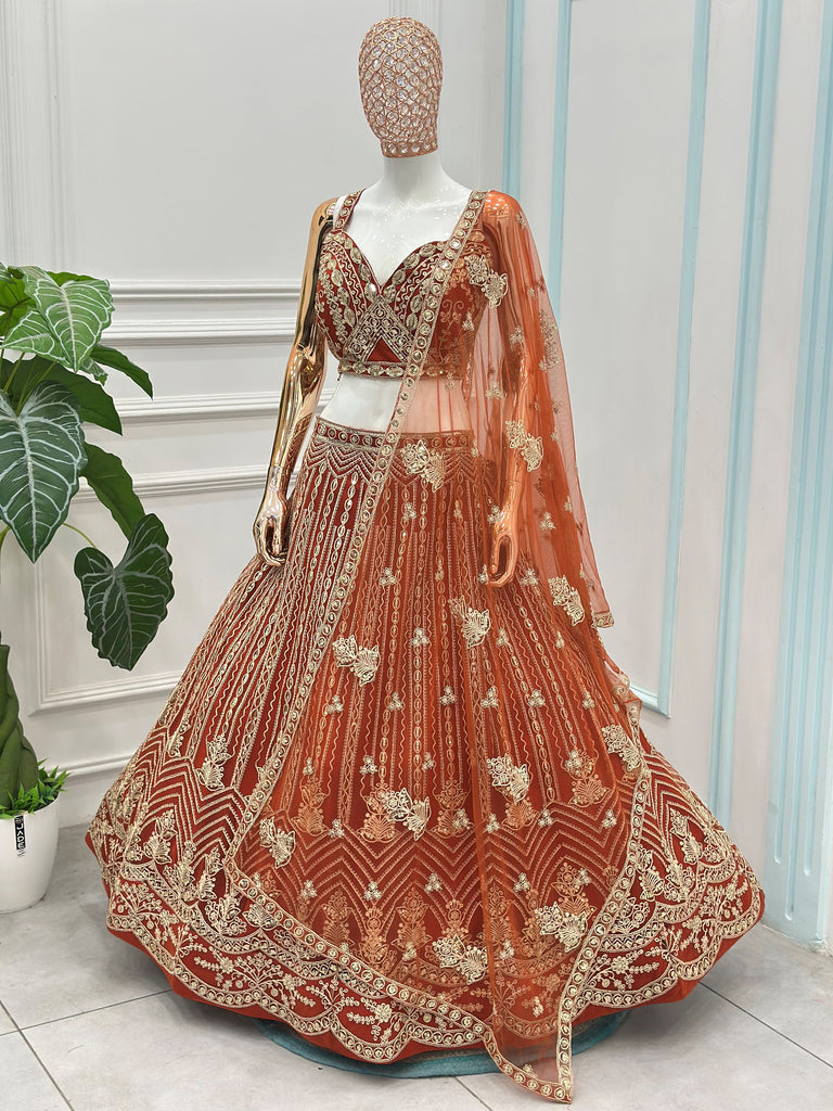 Grand Orange Heavy Embroidered Net Reception Wear Lehenga Choli