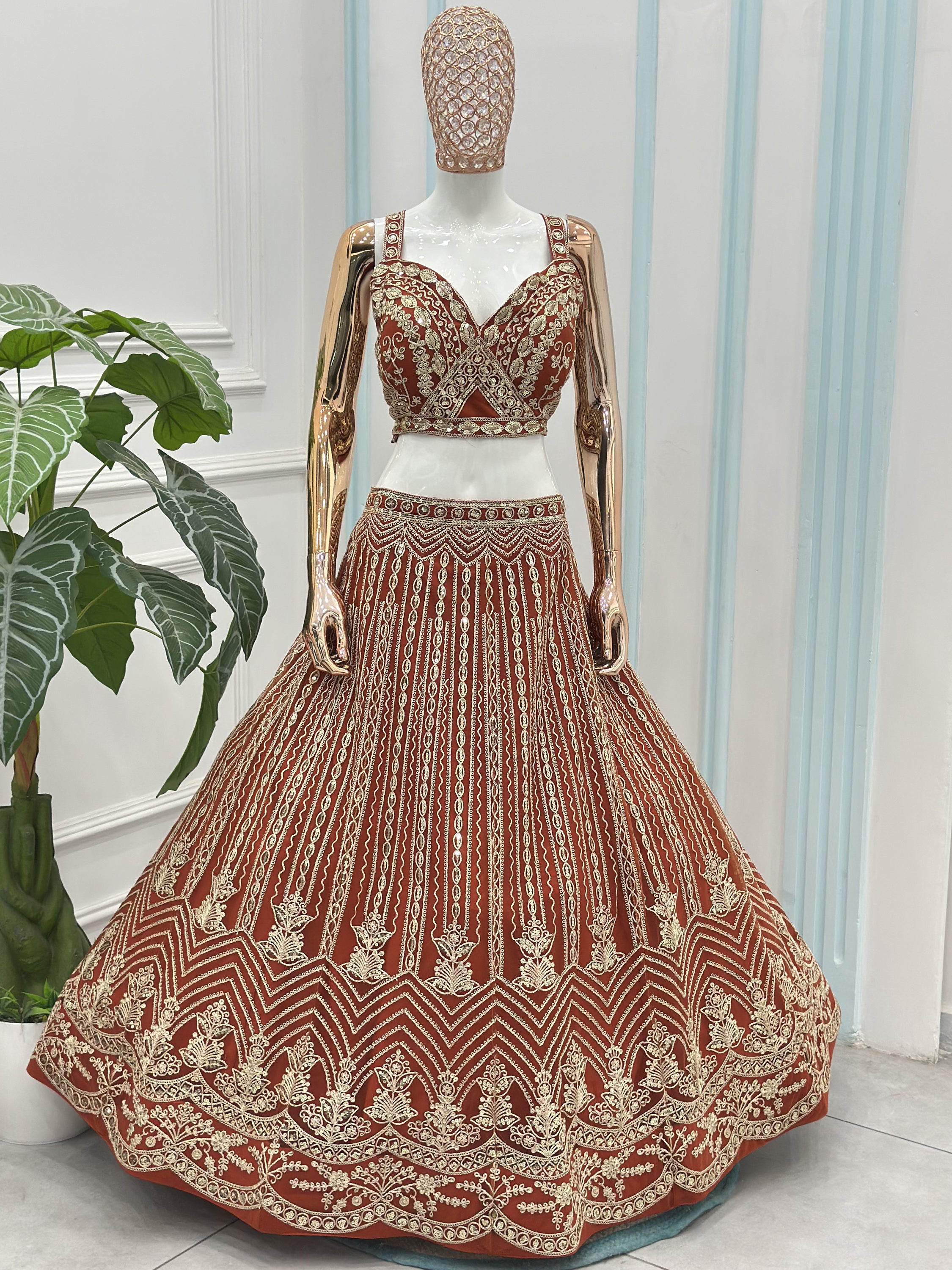 Grand Orange Heavy Embroidered Net Reception Wear Lehenga Choli