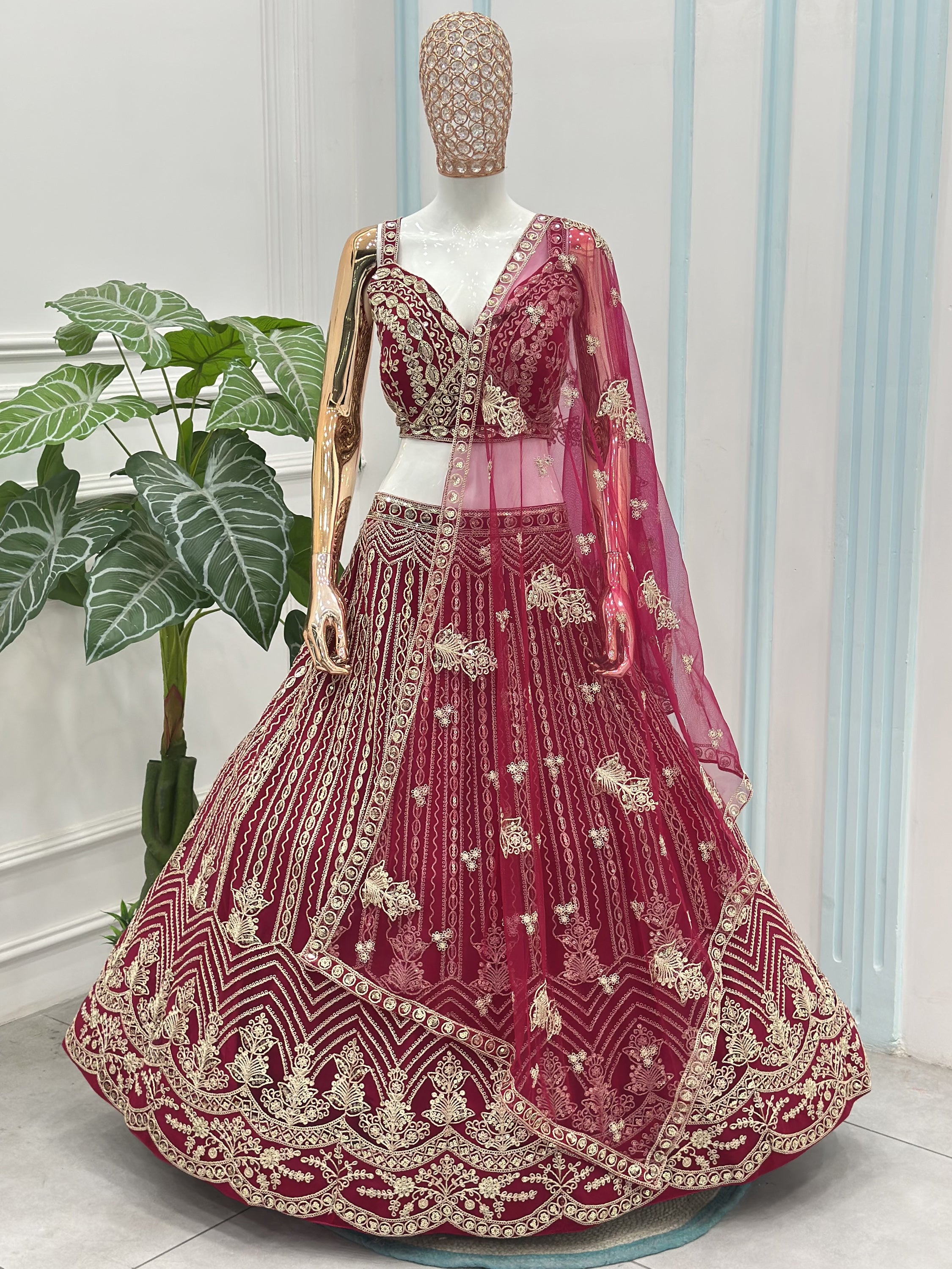 Terrific Pink Codding Embroidered Net Engagement Wear Lehenga Choli