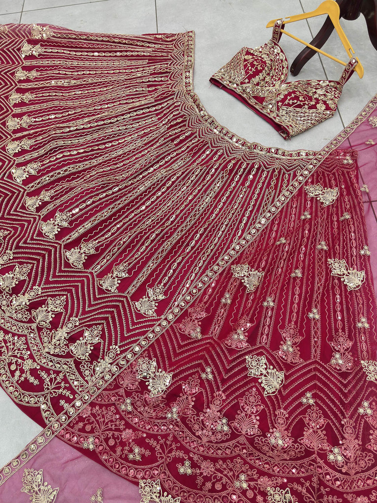 Terrific Pink Codding Embroidered Net Engagement Wear Lehenga Choli