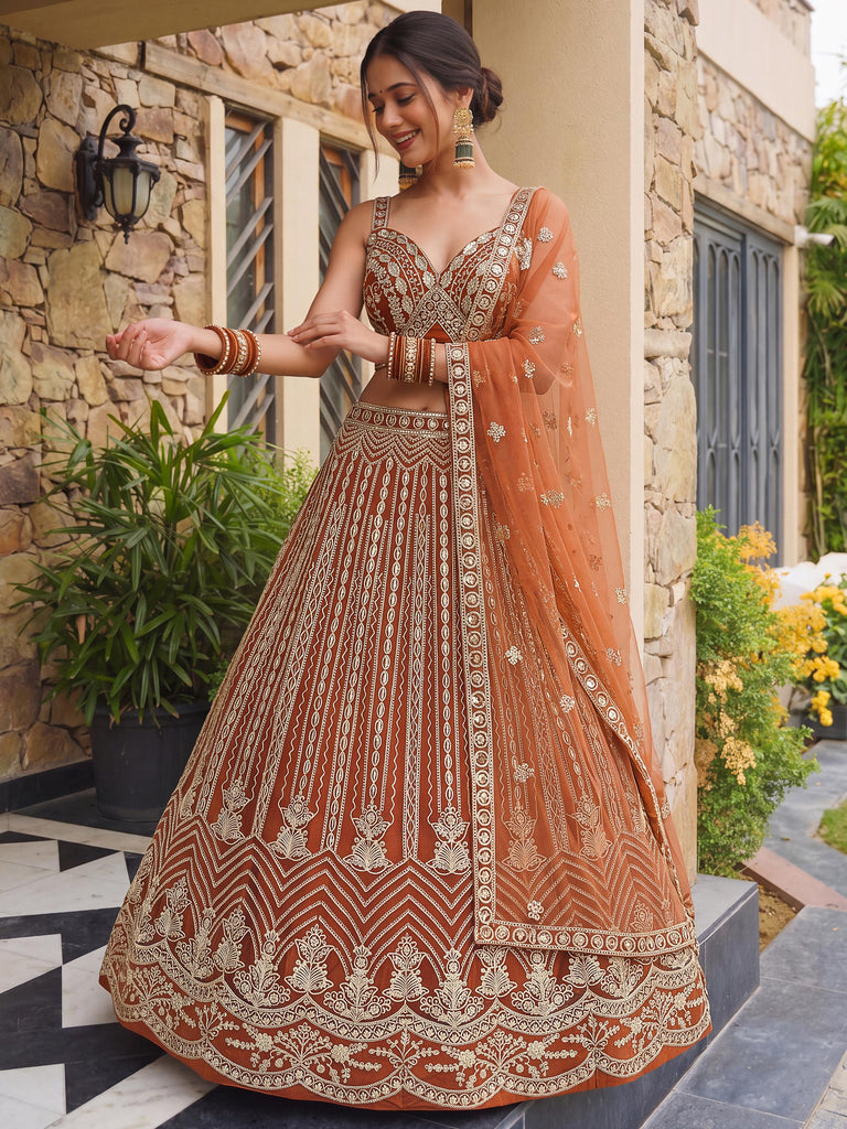 Grand Orange Heavy Embroidered Net Reception Wear Lehenga Choli