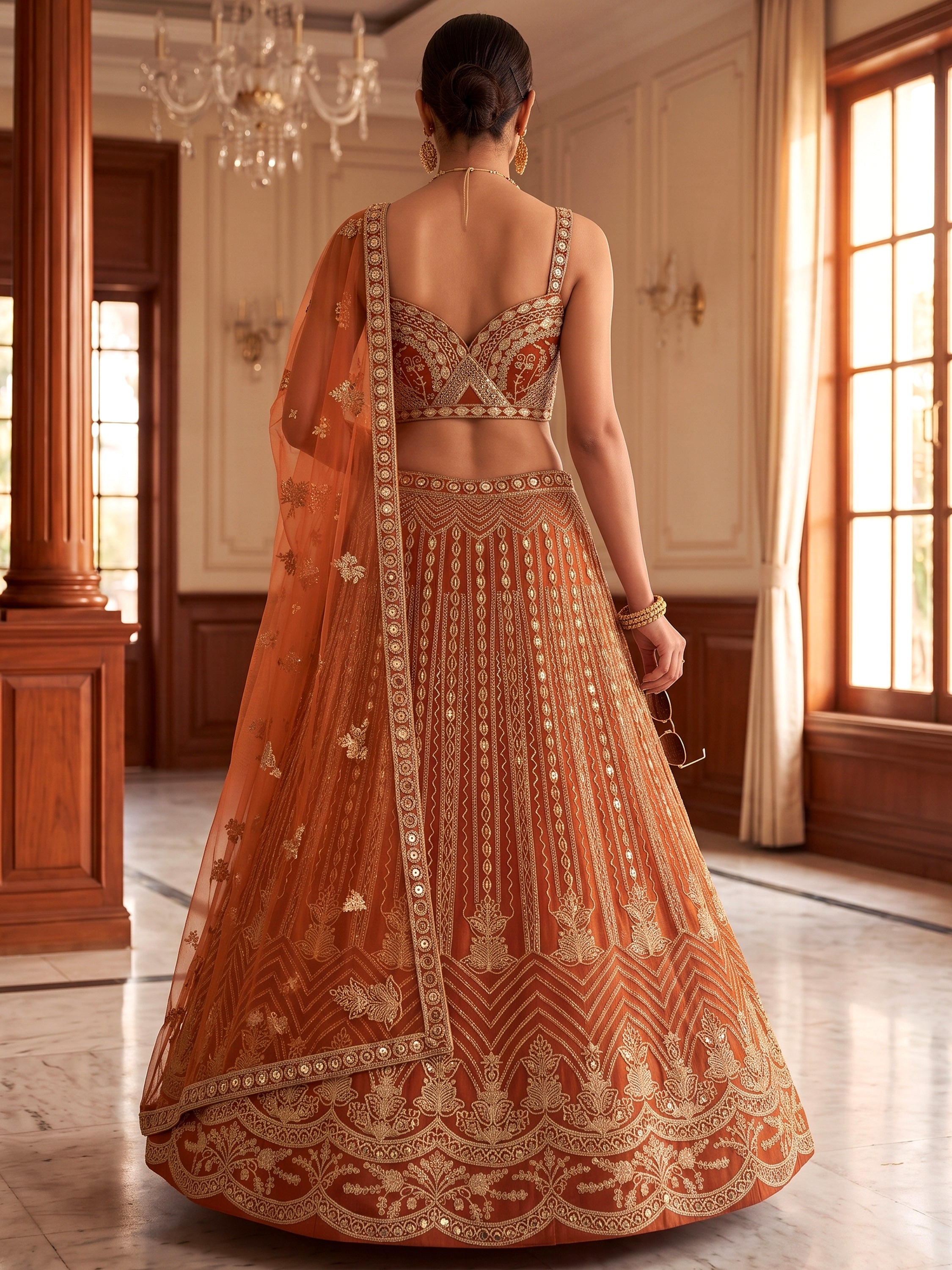 Grand Orange Heavy Embroidered Net Reception Wear Lehenga Choli