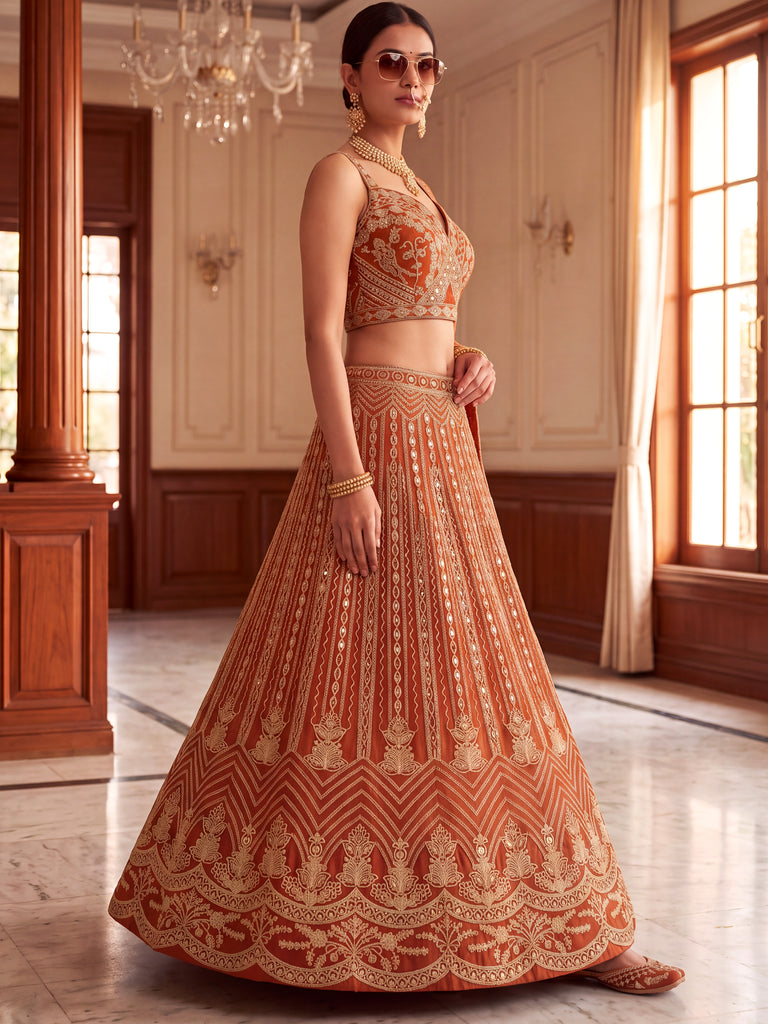 Grand Orange Heavy Embroidered Net Reception Wear Lehenga Choli