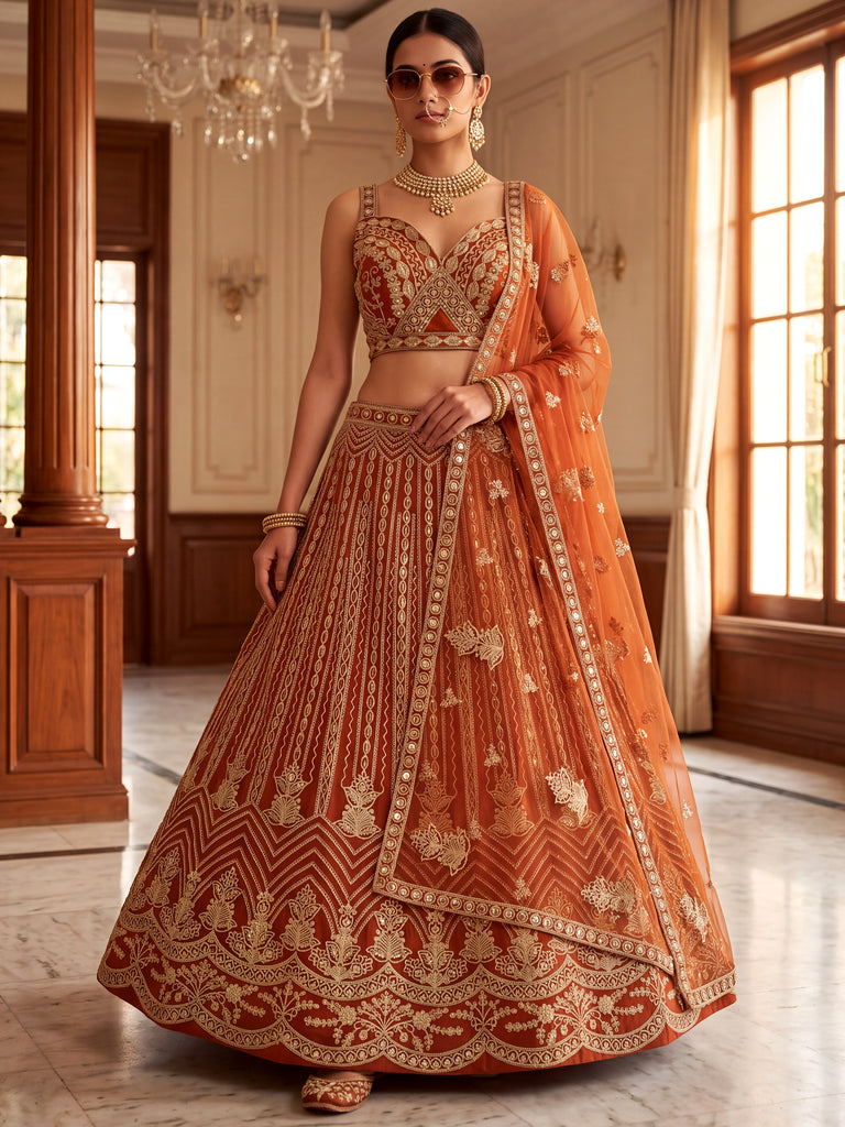 Grand Orange Heavy Embroidered Net Reception Wear Lehenga Choli