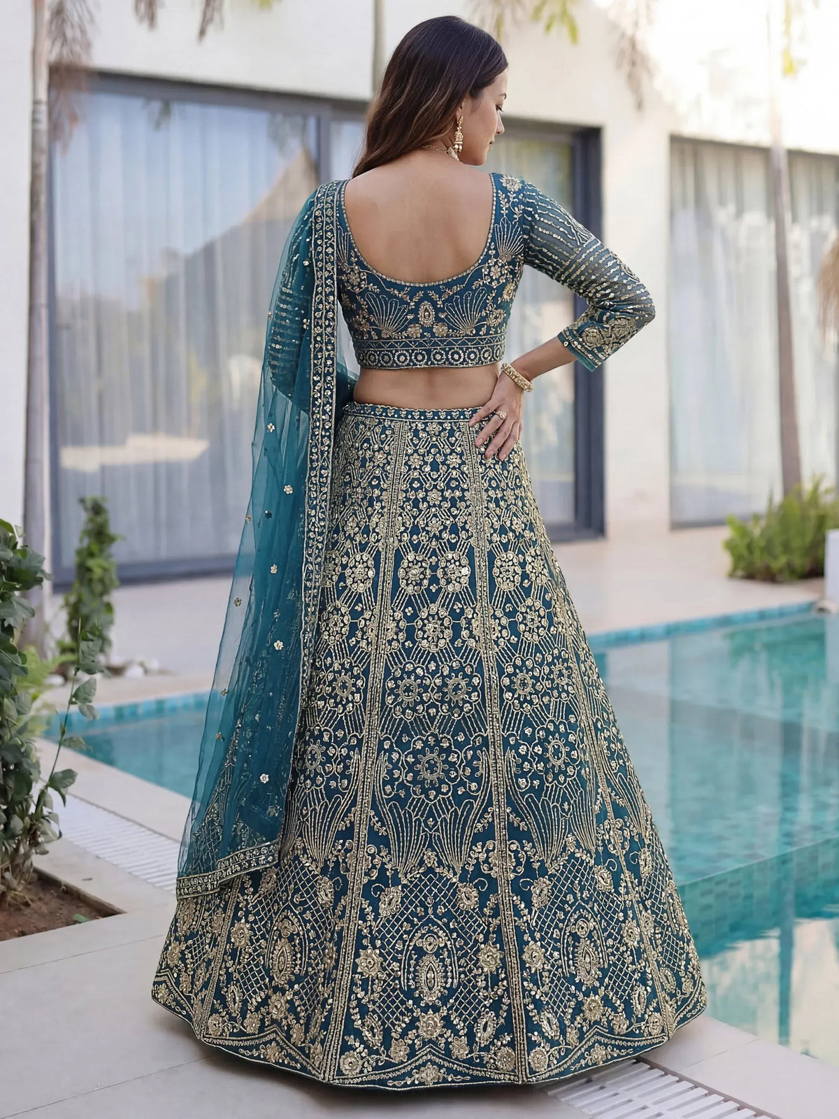 Splendid Teal Blue Sequins Net Party Wear Lehenga With Blouse