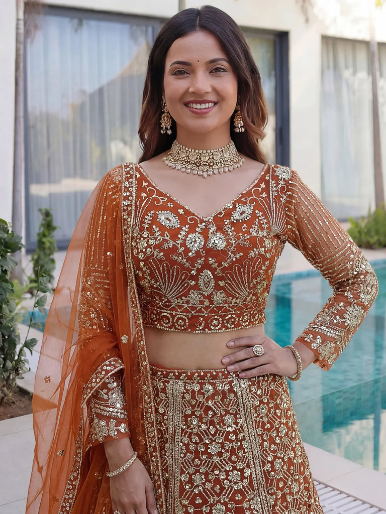 Gorgeous Orange Sequins Net Evening Wear Lehenga Choli With Dupatta