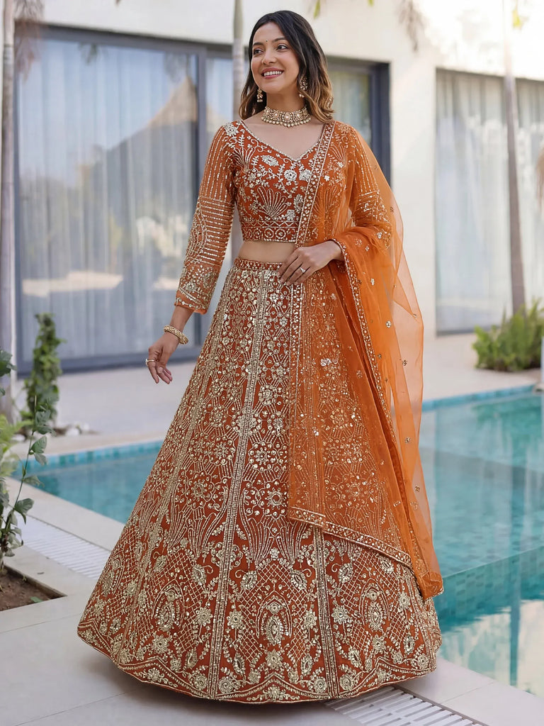 Gorgeous Orange Sequins Net Evening Wear Lehenga Choli With Dupatta