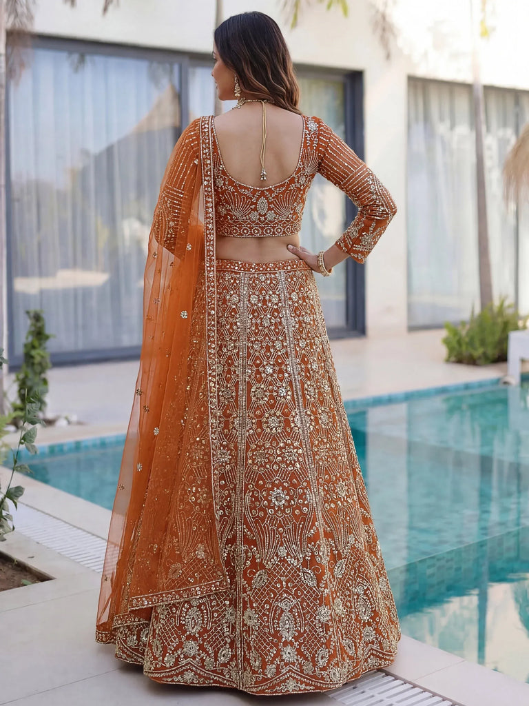 Gorgeous Orange Sequins Net Evening Wear Lehenga Choli With Dupatta
