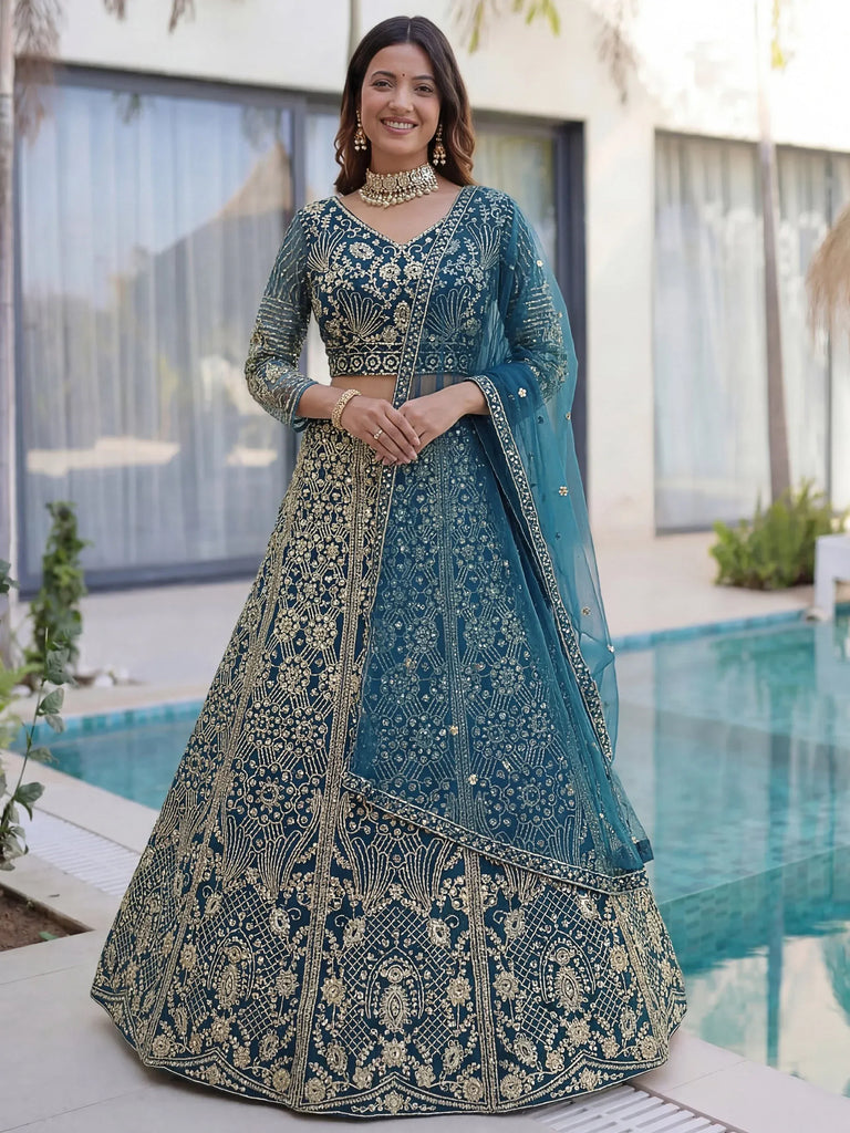 Splendid Teal Blue Sequins Net Party Wear Lehenga With Blouse