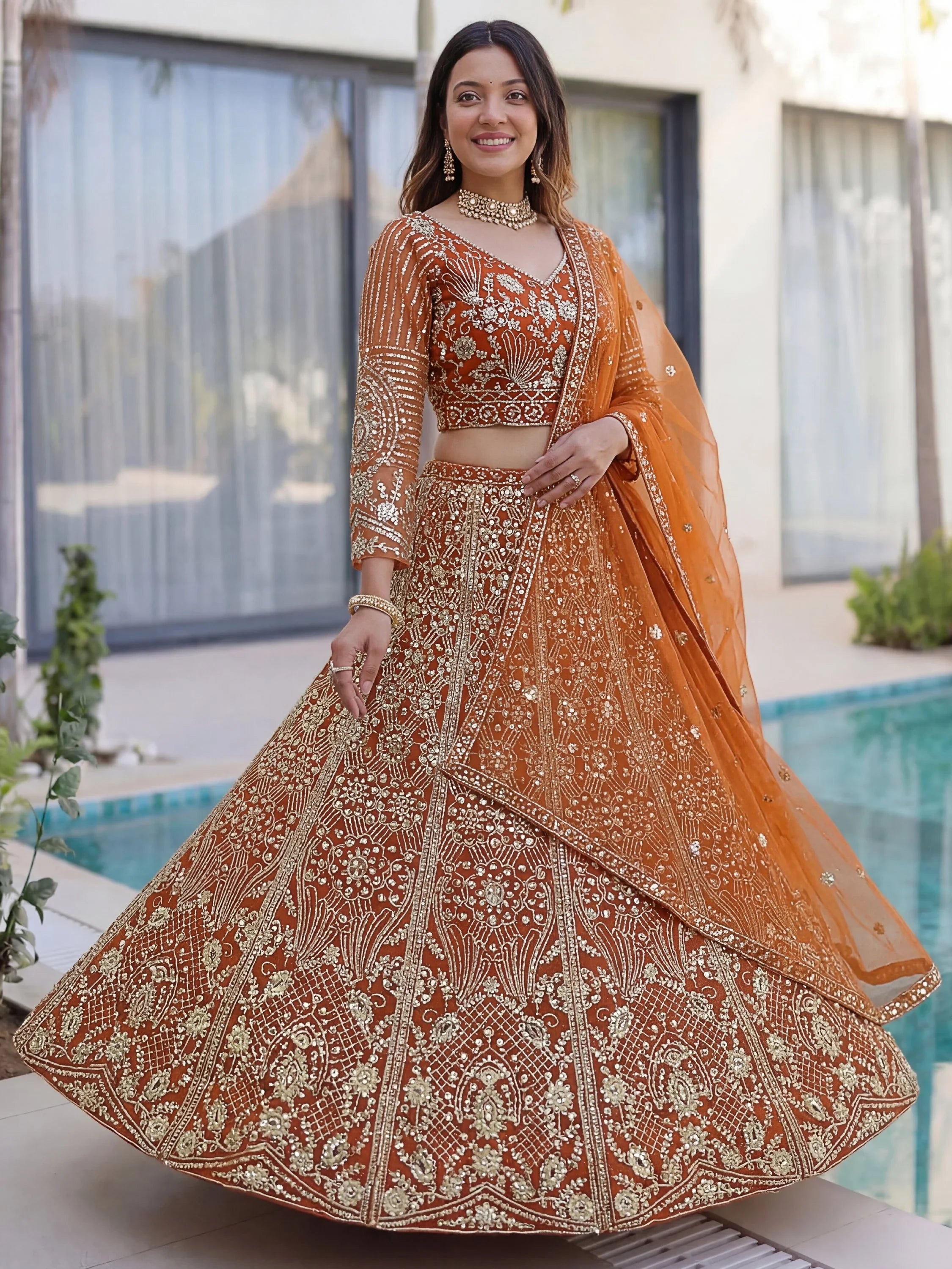 Gorgeous Orange Sequins Net Evening Wear Lehenga Choli With Dupatta