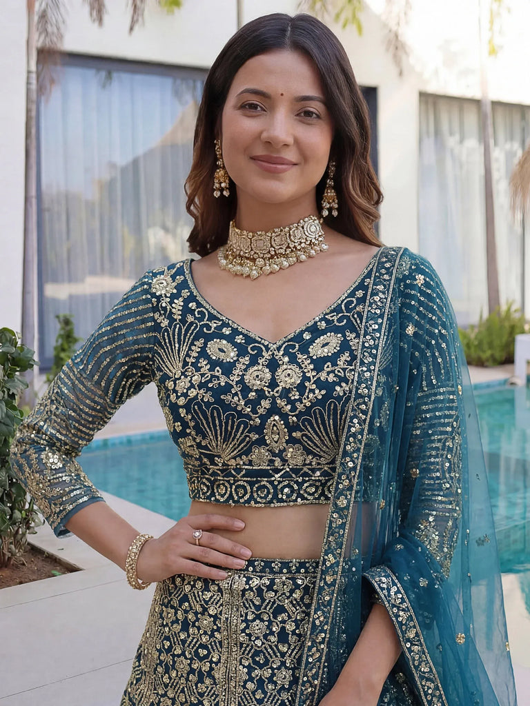 Splendid Teal Blue Sequins Net Party Wear Lehenga With Blouse