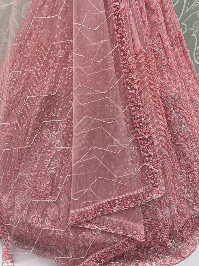 Monochrome Pink Embroidered Net Reception Wear Lehenga Choli