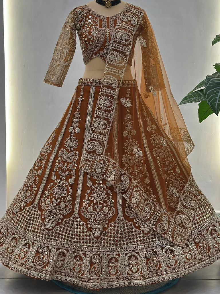 Fabulous Orange Embroidered Net Reception Wear Lehenga Choli