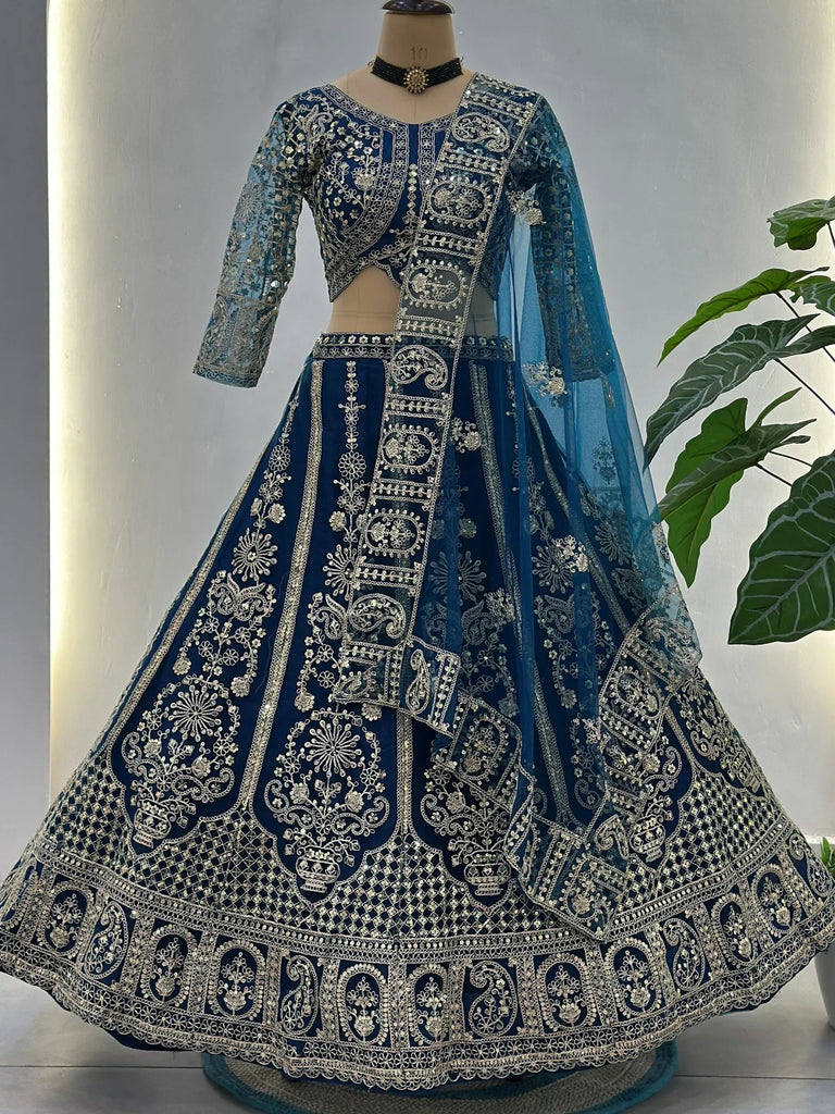 Adorable Teal Blue Embroidered Net Party Wear Lehenga Choli