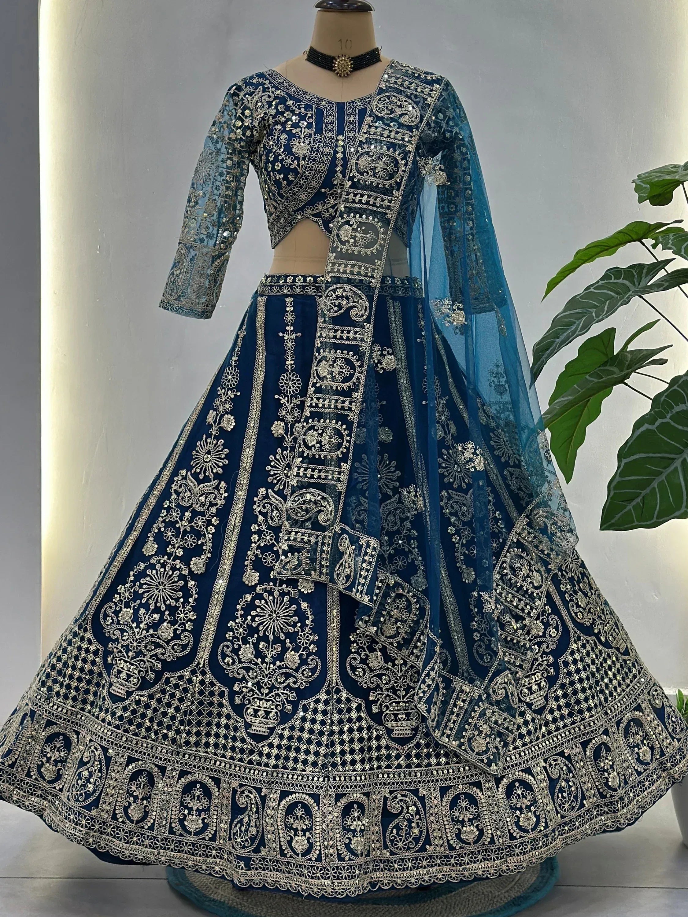 Adorable Teal Blue Embroidered Net Party Wear Lehenga Choli