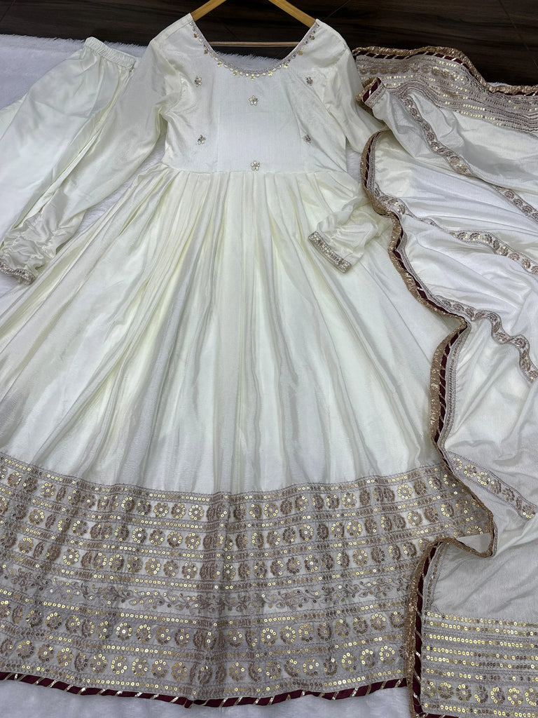Gorgeous Off-White Embroidered Silk Wedding Wear Gown With Dupatta