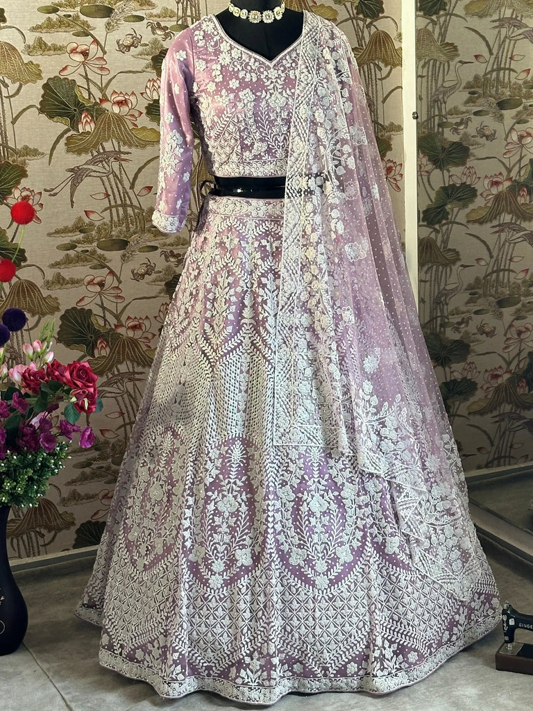 Astonishing Lilac Pearl Work Net Reception Wear Lehenga Choli