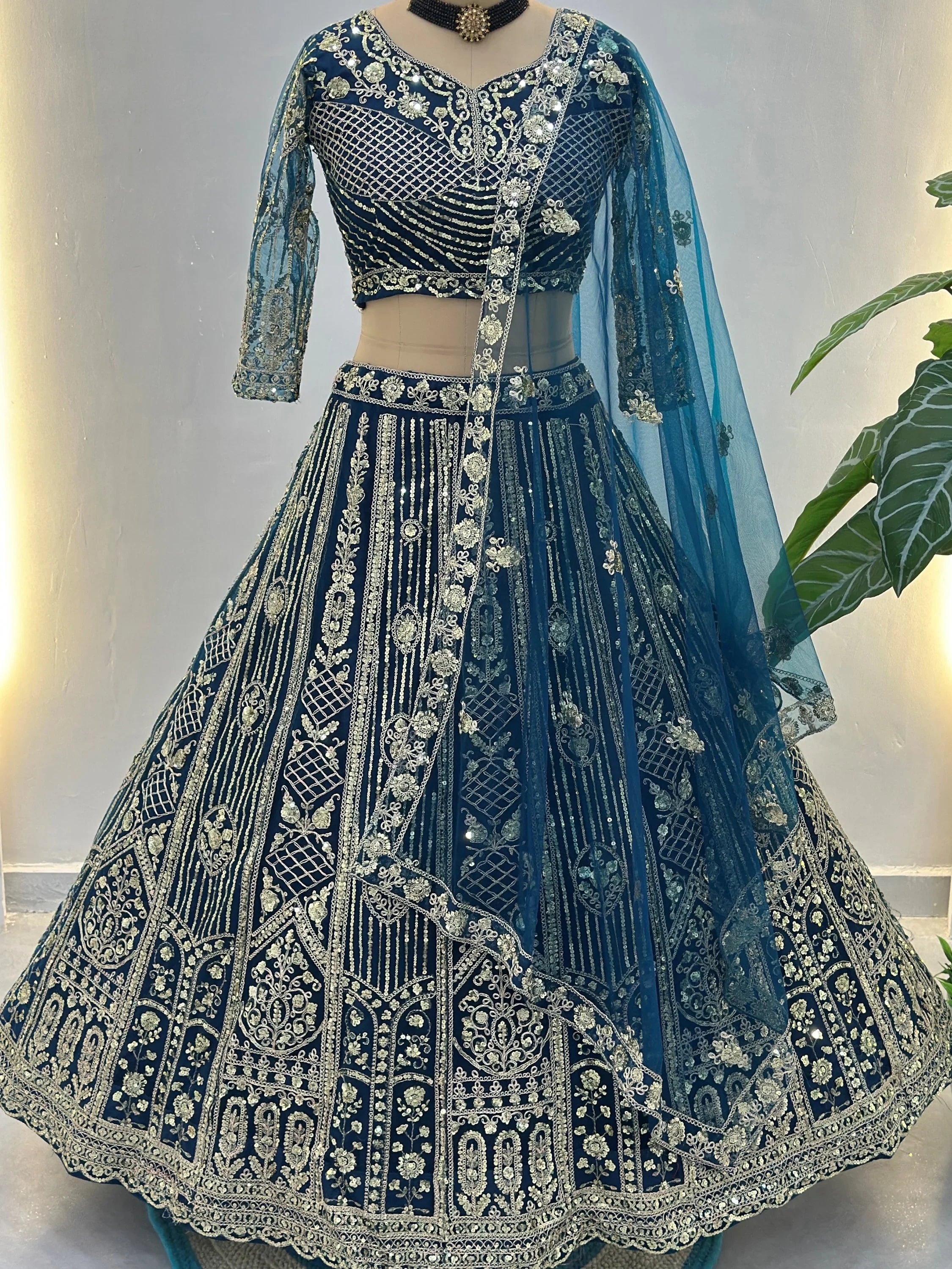 Amazing Blue Sequins Embroidered Net Party Wear Lehenga Choli