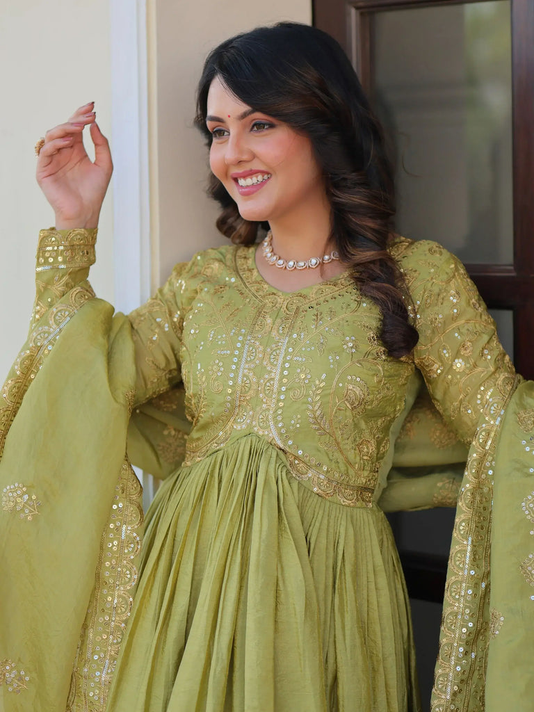 Tantalizing Pista Green Organza Mehendi Wear Gown With Dupatta