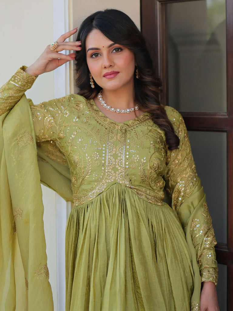 Tantalizing Pista Green Organza Mehendi Wear Gown With Dupatta