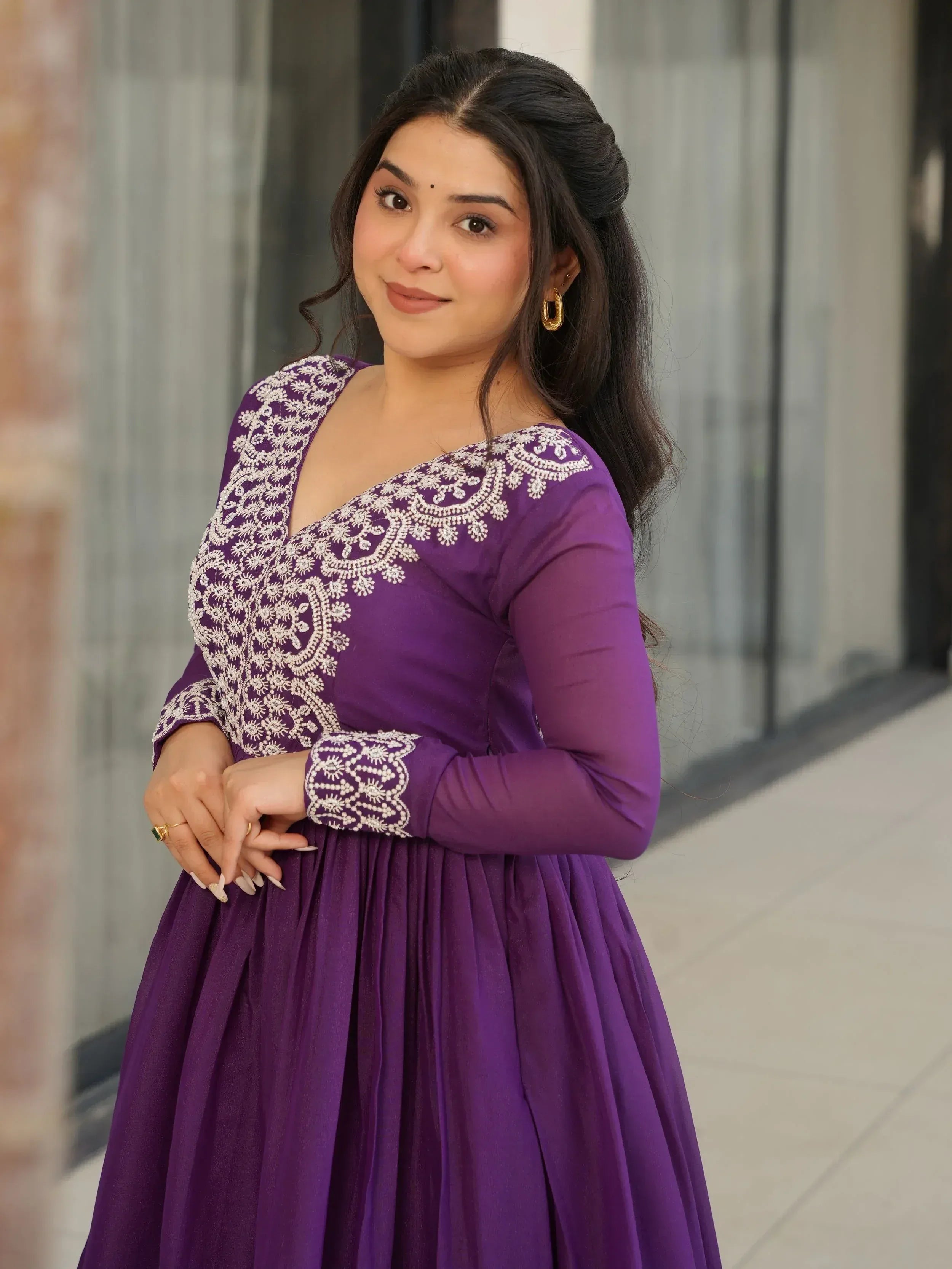 Purple ethnic gown with white embroidery, long sleeves, and pleated skirt for women