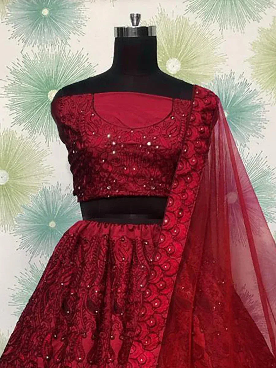 Red embroidered lehenga choli with sheer dupatta, designer ethnic wear for weddings