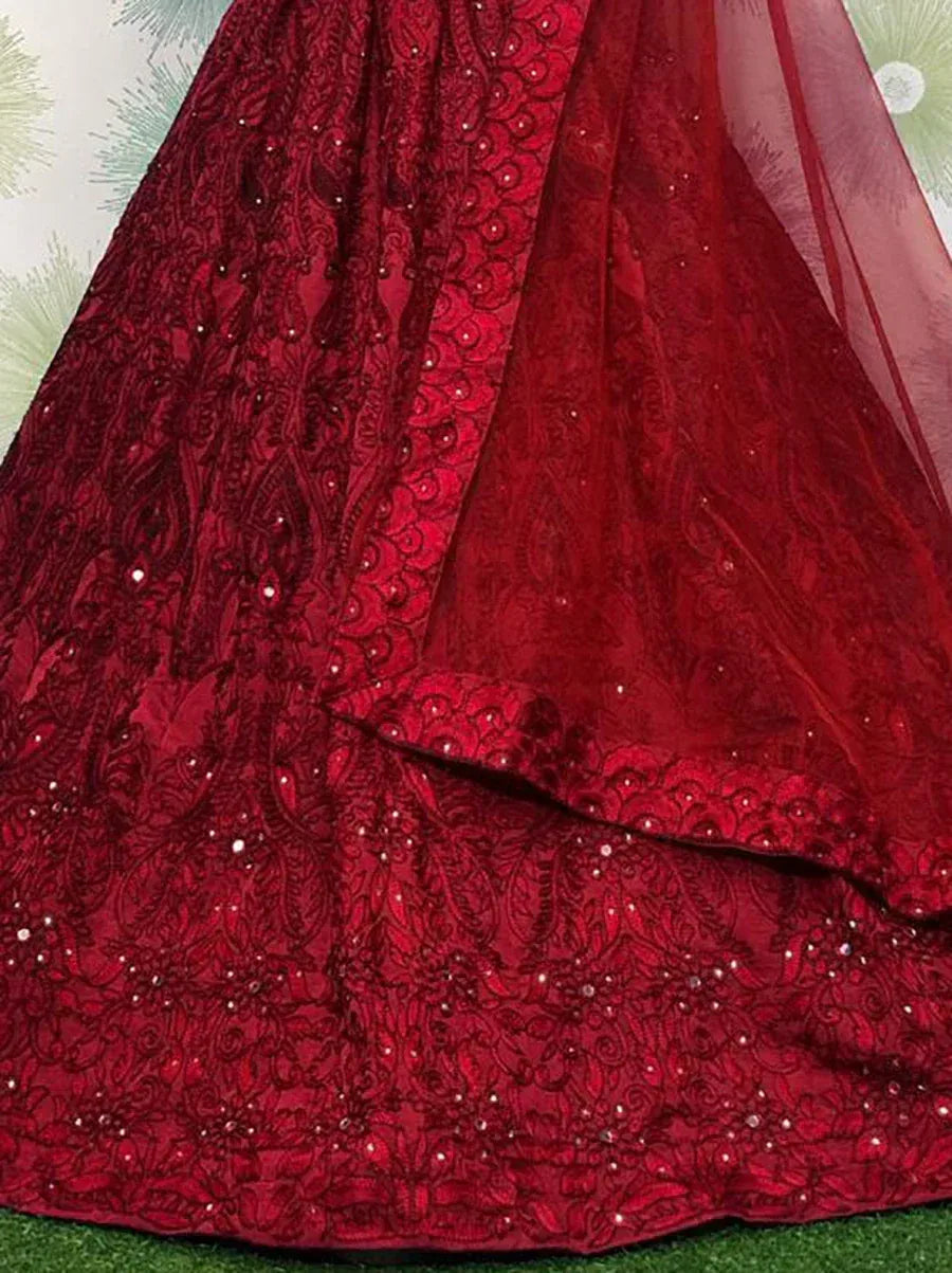 Red embroidered lehenga with sequin detailing, perfect for Indian ethnic wear and festive occasions.