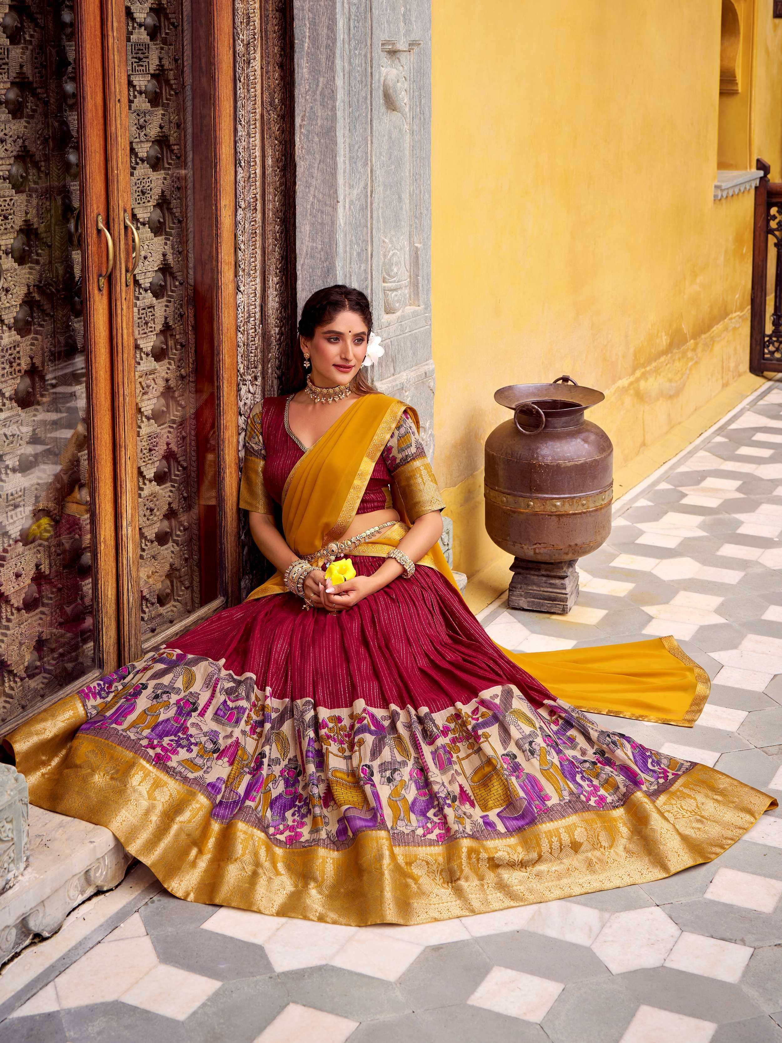Maroon and mustard designer lehenga choli with printed border, perfect for Indian ethnic wear occasions