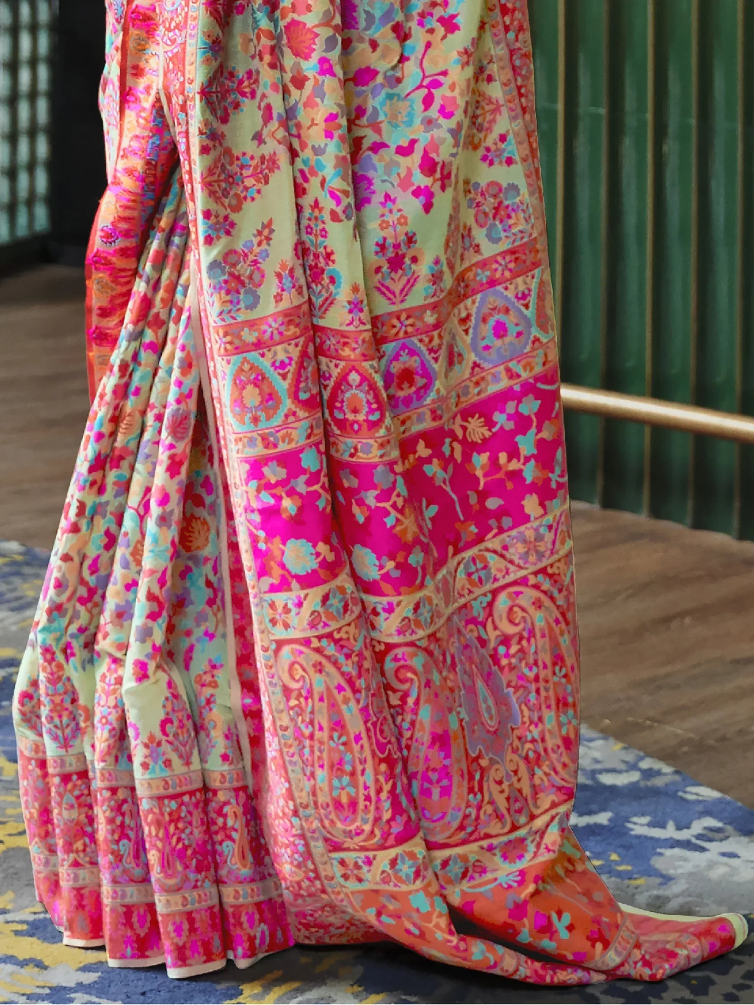 Vibrant floral and paisley printed Indian ethnic lehenga choli with colorful border details