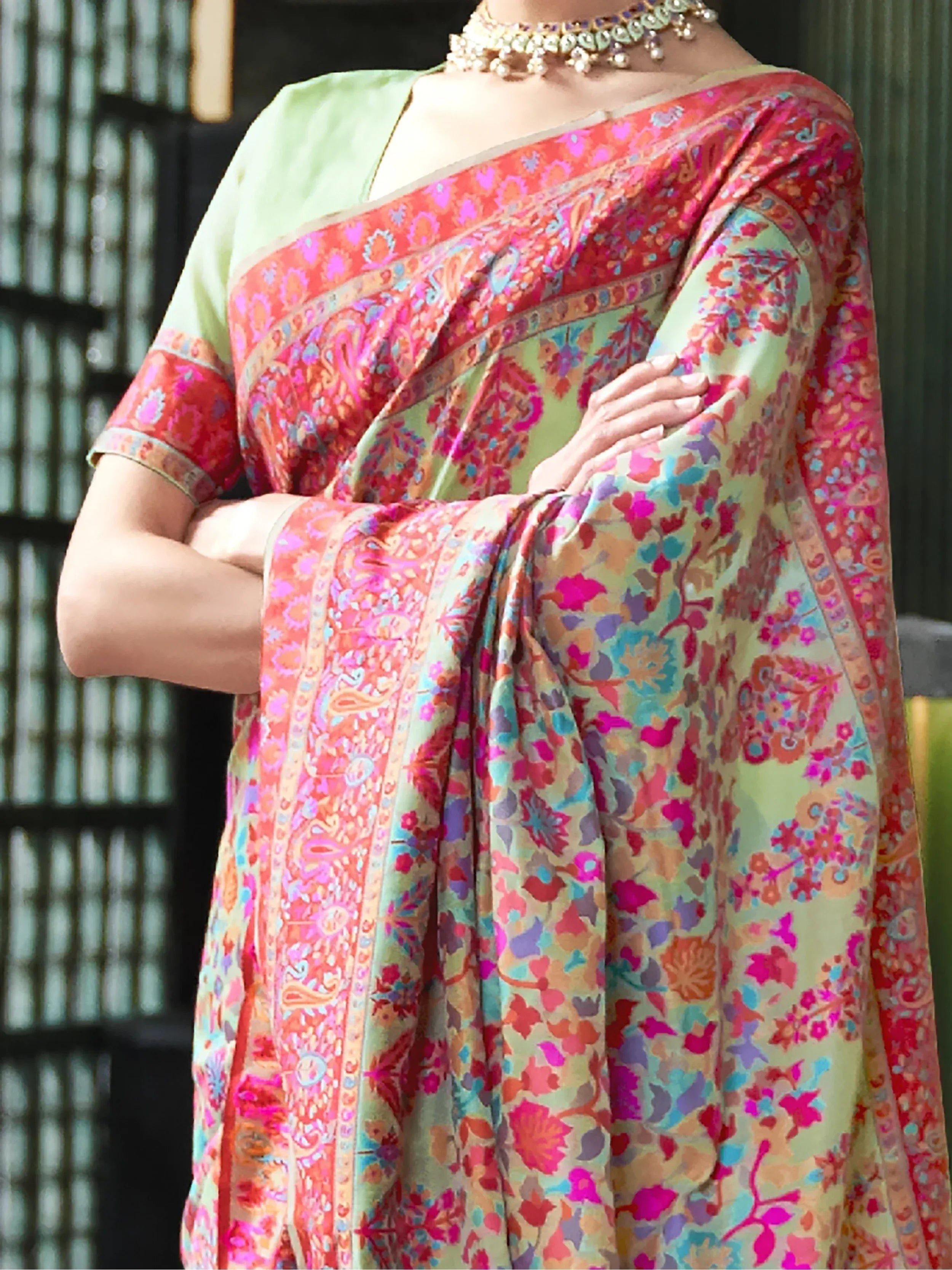 Vibrant floral and paisley printed saree with green blouse, perfect for Indian ethnic wear occasions