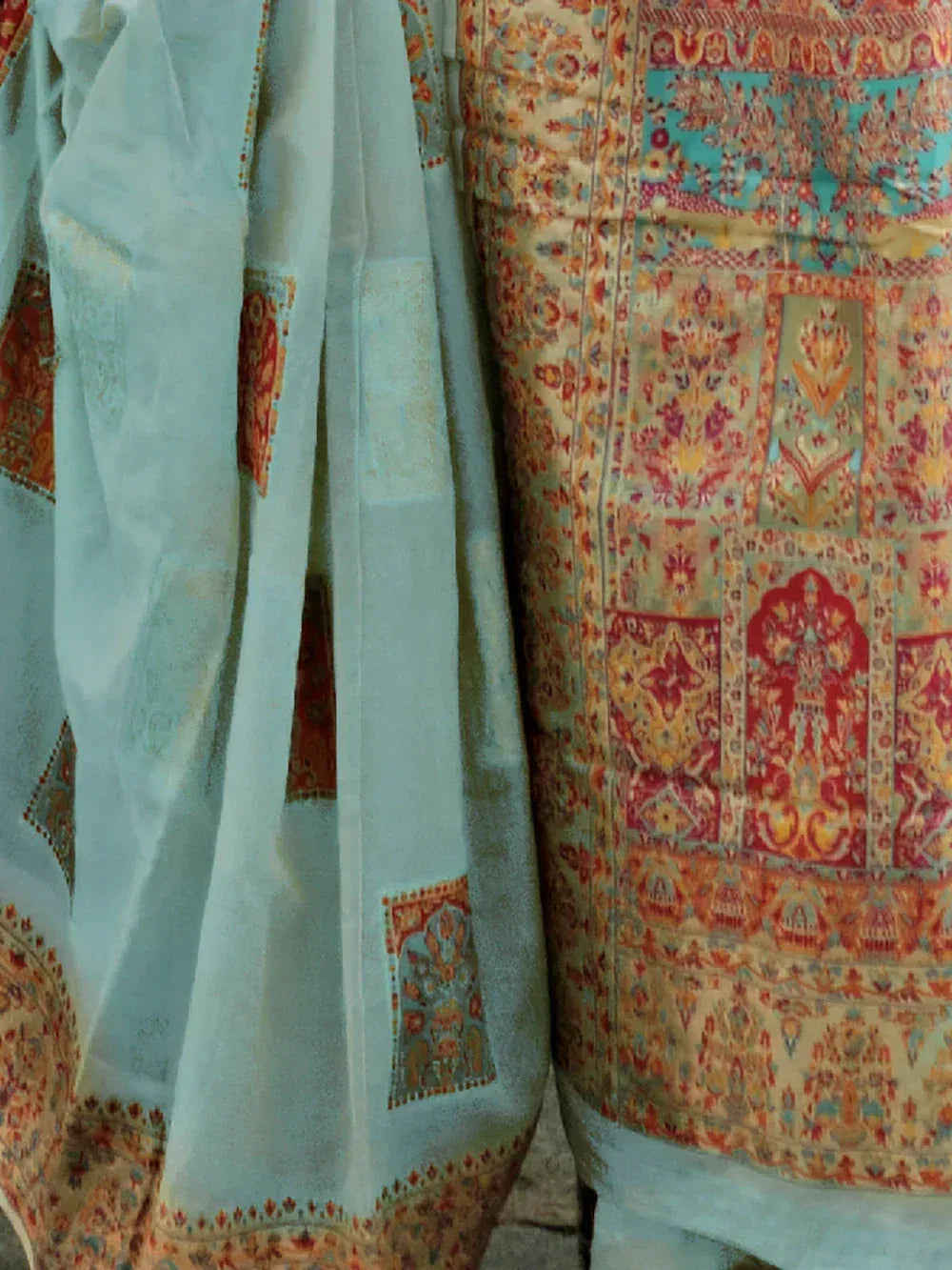 Light blue and multicolor printed ethnic saree with intricate floral and geometric patterns