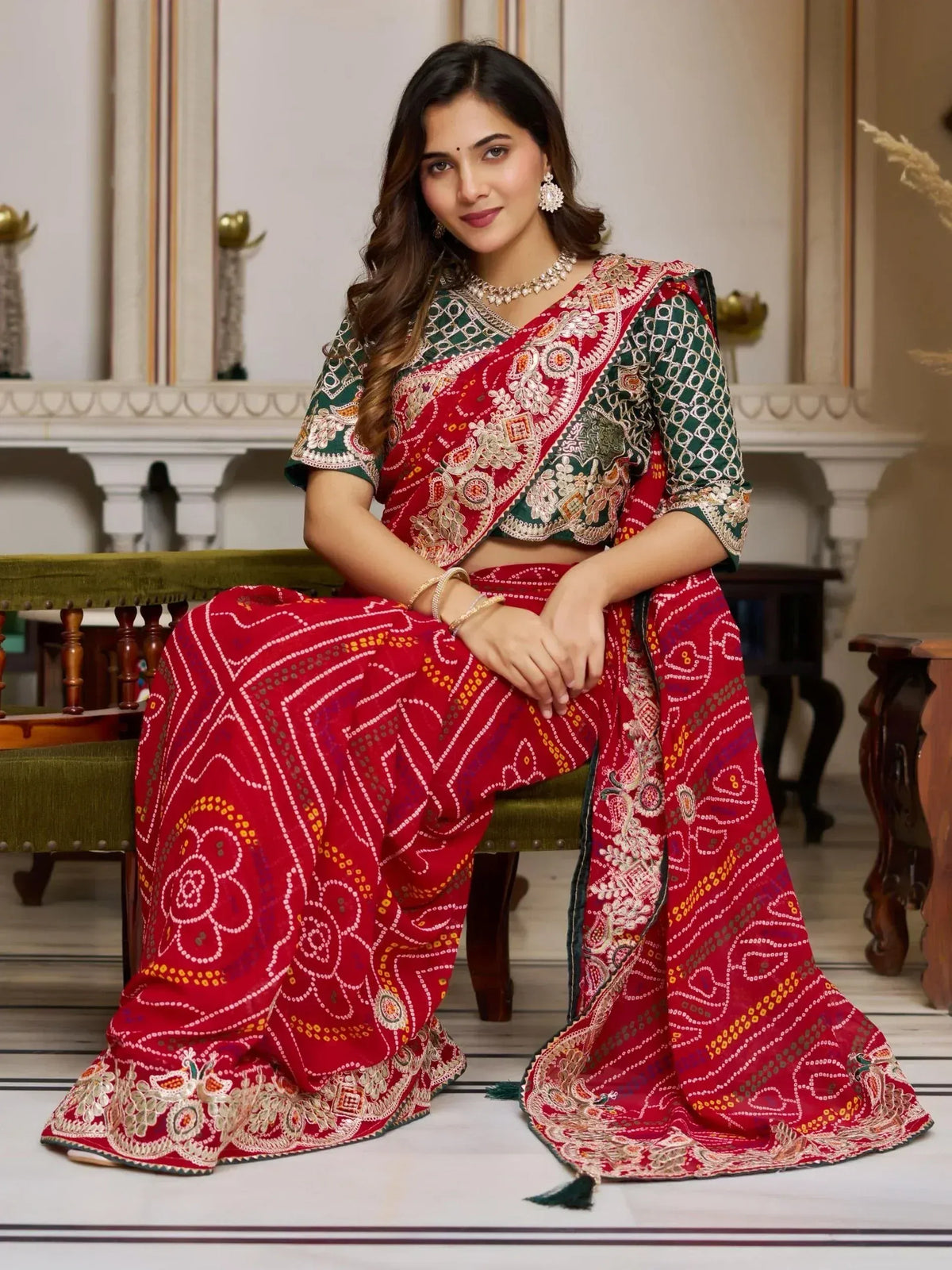 Red and green embroidered lehenga choli with intricate patterns, perfect for Indian ethnic wear occasions