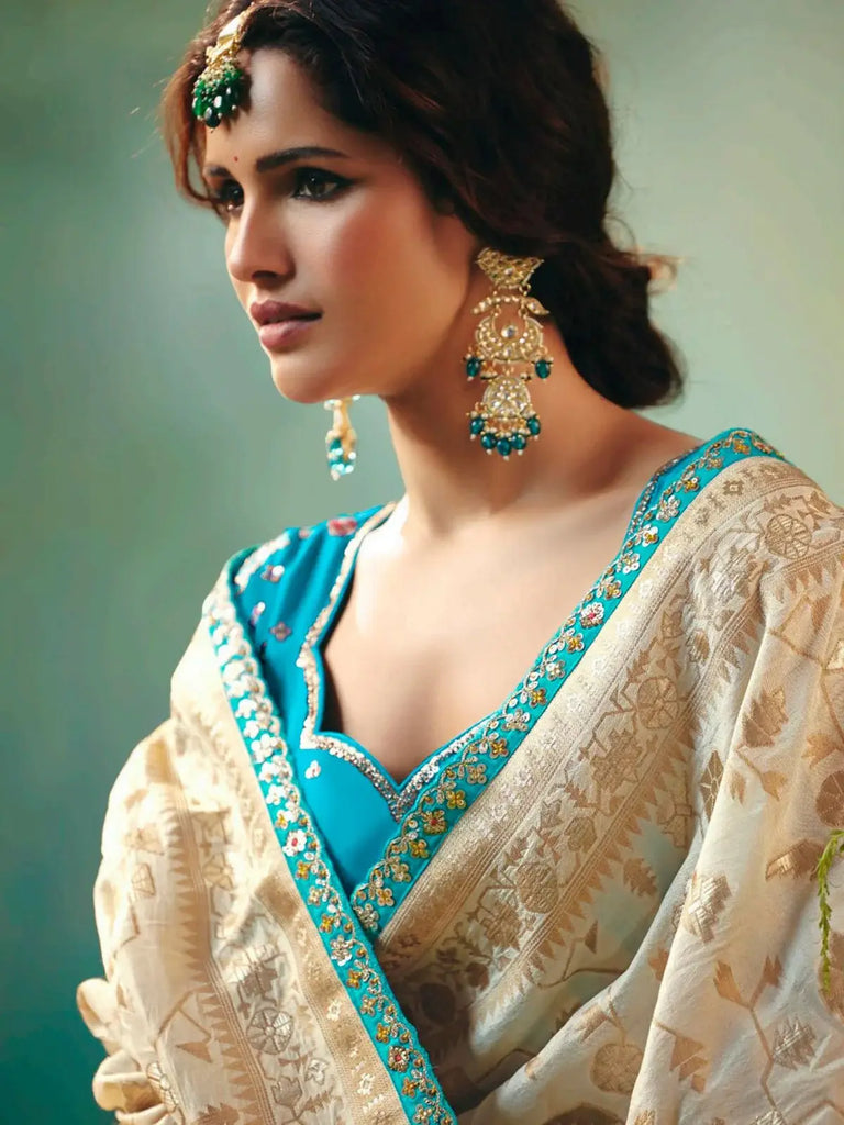 Stunning Off-White Hand Embroidered Tissue Festival Wear Saree With Blouse