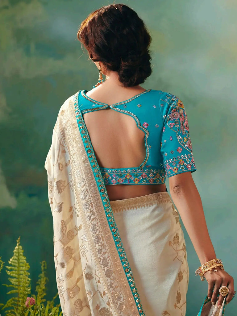Stunning Off-White Hand Embroidered Tissue Festival Wear Saree With Blouse