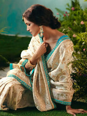 Stunning Off-White Hand Embroidered Tissue Festival Wear Saree With Blouse