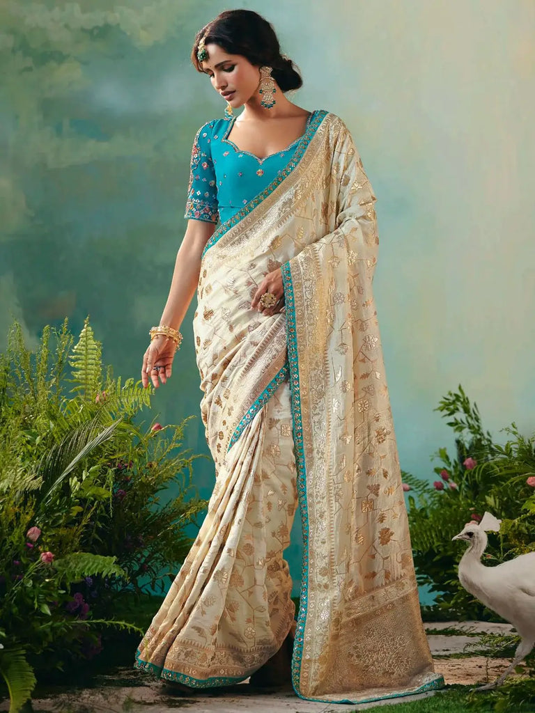 Stunning Off-White Hand Embroidered Tissue Festival Wear Saree With Blouse