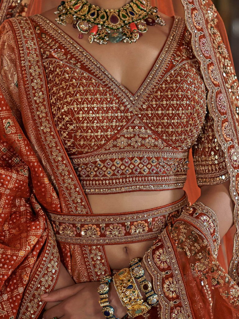 Good-looking Orange Pearl Work Silk Bridal Lehenga Choli With Double Dupatta