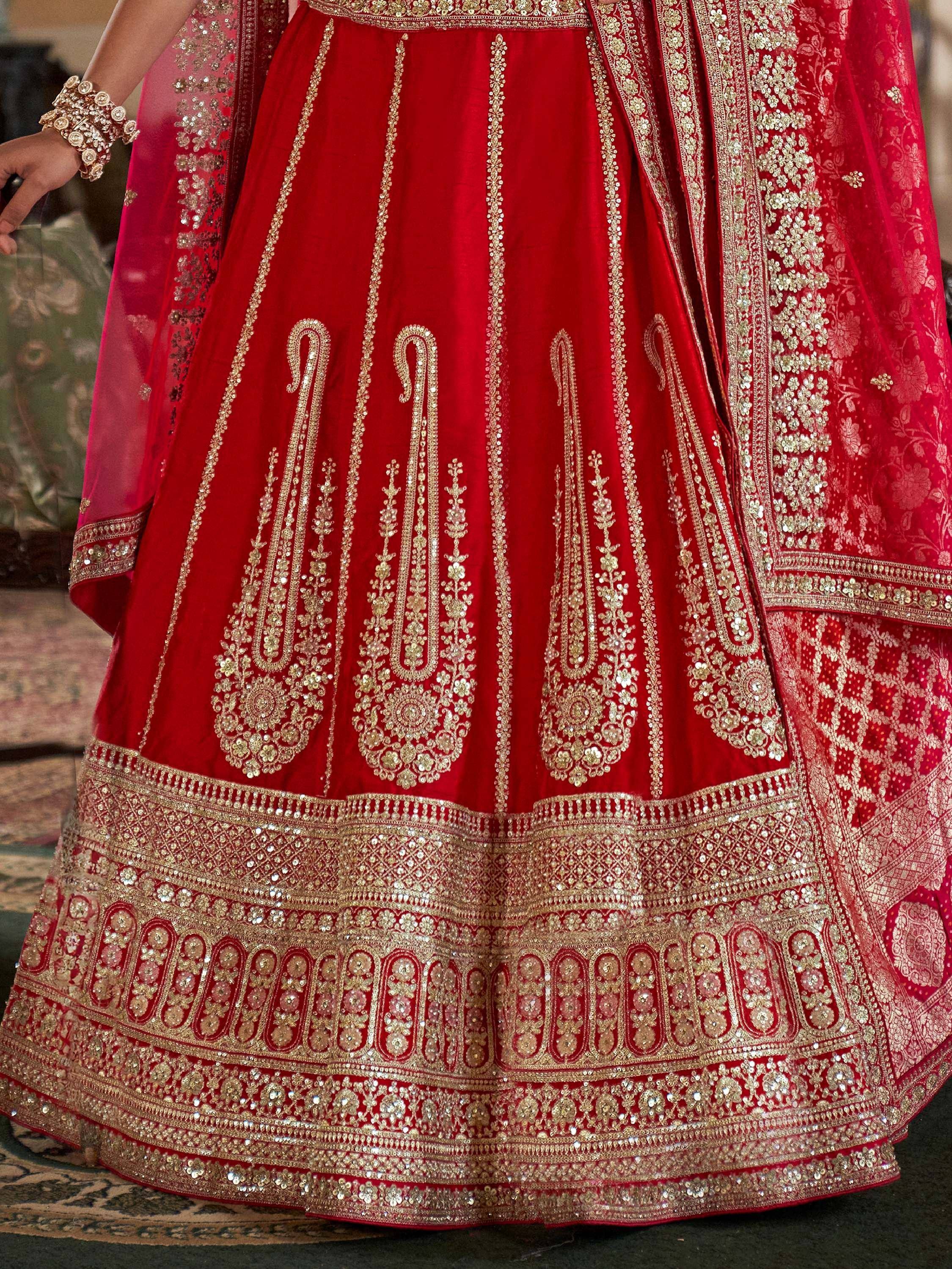 Red velvet lehenga with gold embroidery and sequin work, traditional Indian ethnic wear