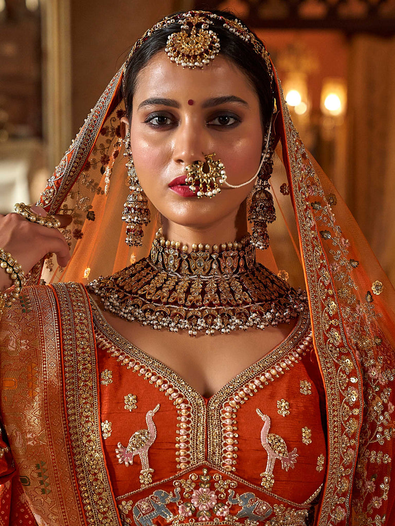 Enchanting Orange Prarl Work Silk Bridal Wear Lehenga Choli With Double Dupatta