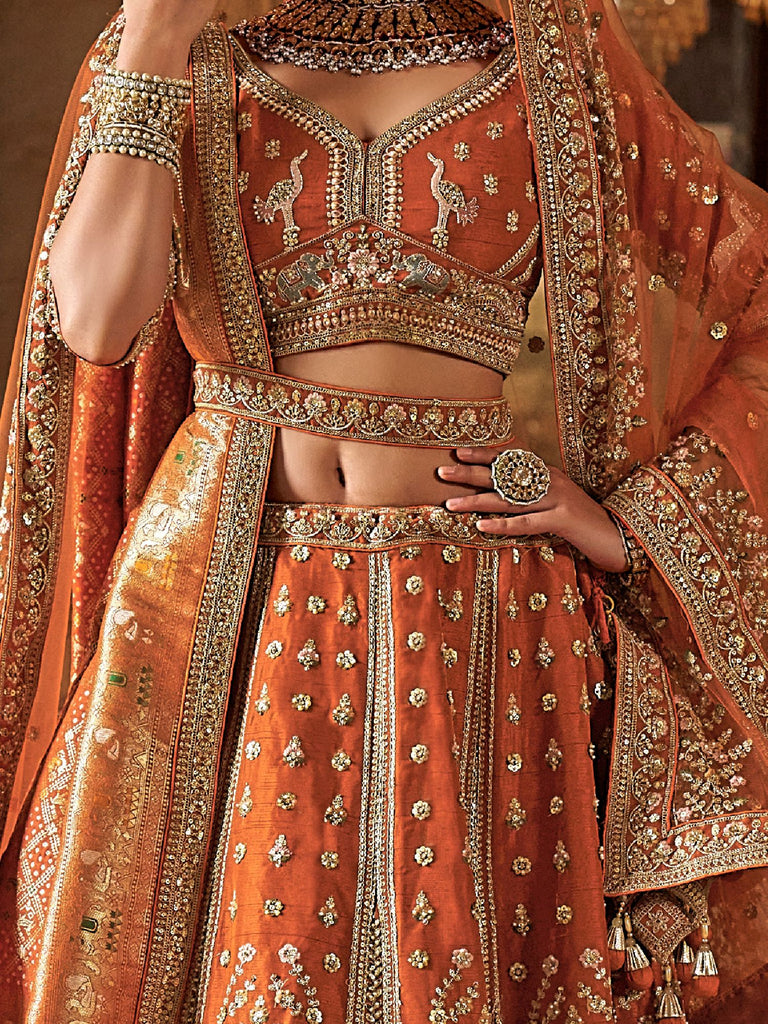 Enchanting Orange Prarl Work Silk Bridal Wear Lehenga Choli With Double Dupatta