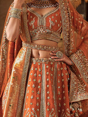 Enchanting Orange Prarl Work Silk Bridal Wear Lehenga Choli With Double Dupatta