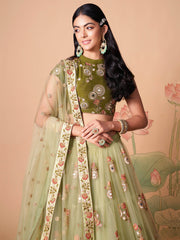Impressive Pista Green Net Embroidered Wedding Lehenga Choli