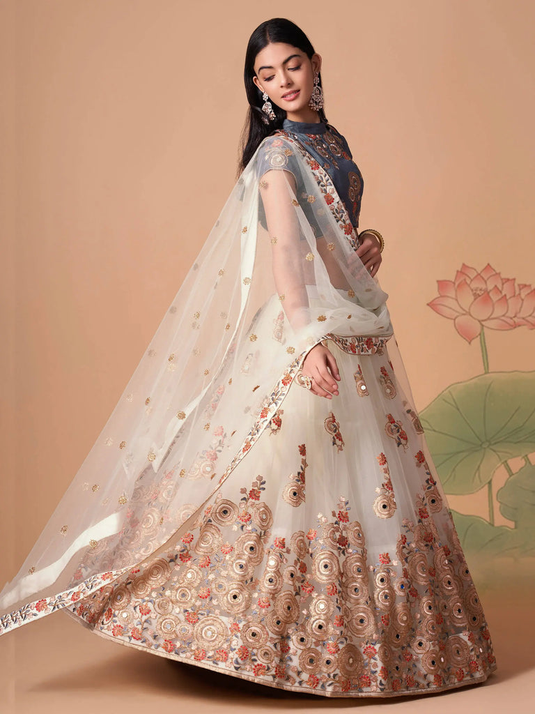 Pretty Ivory Embroidered Net Party Wear Lehenga Choli