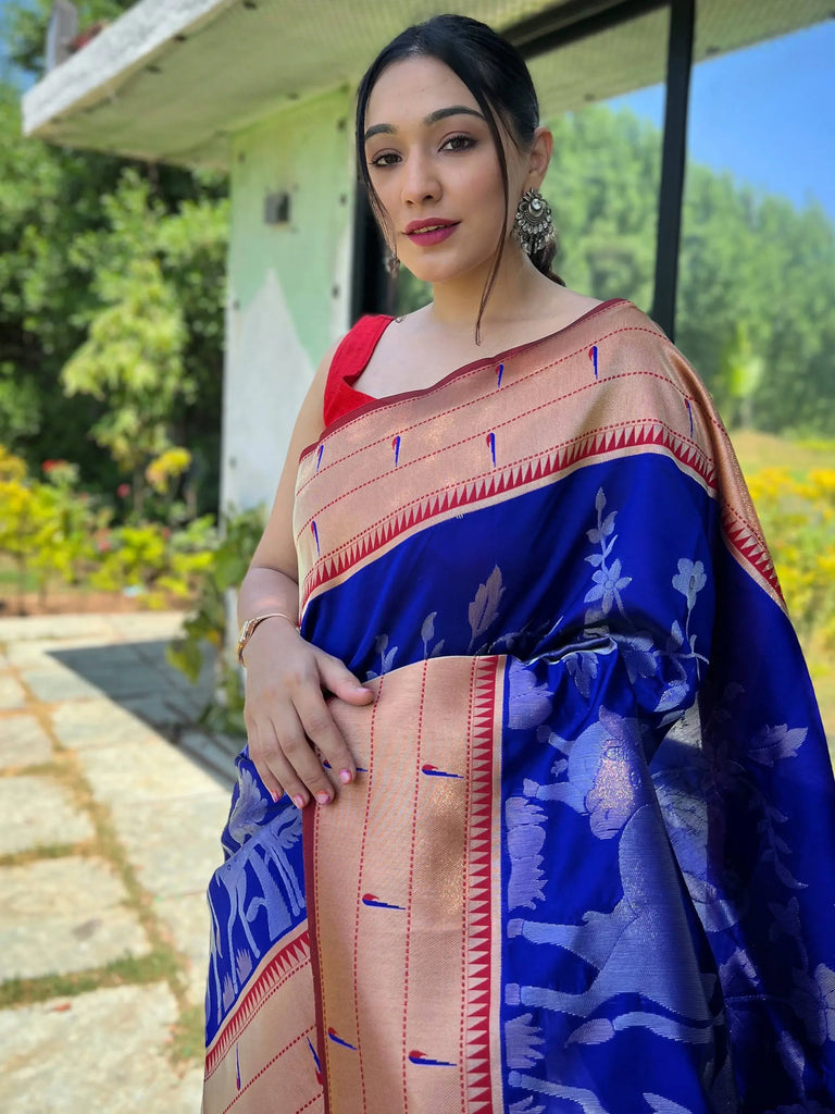 Mesmerizing Blue Paithani Silk Zari Weaving  Saree With Blouse