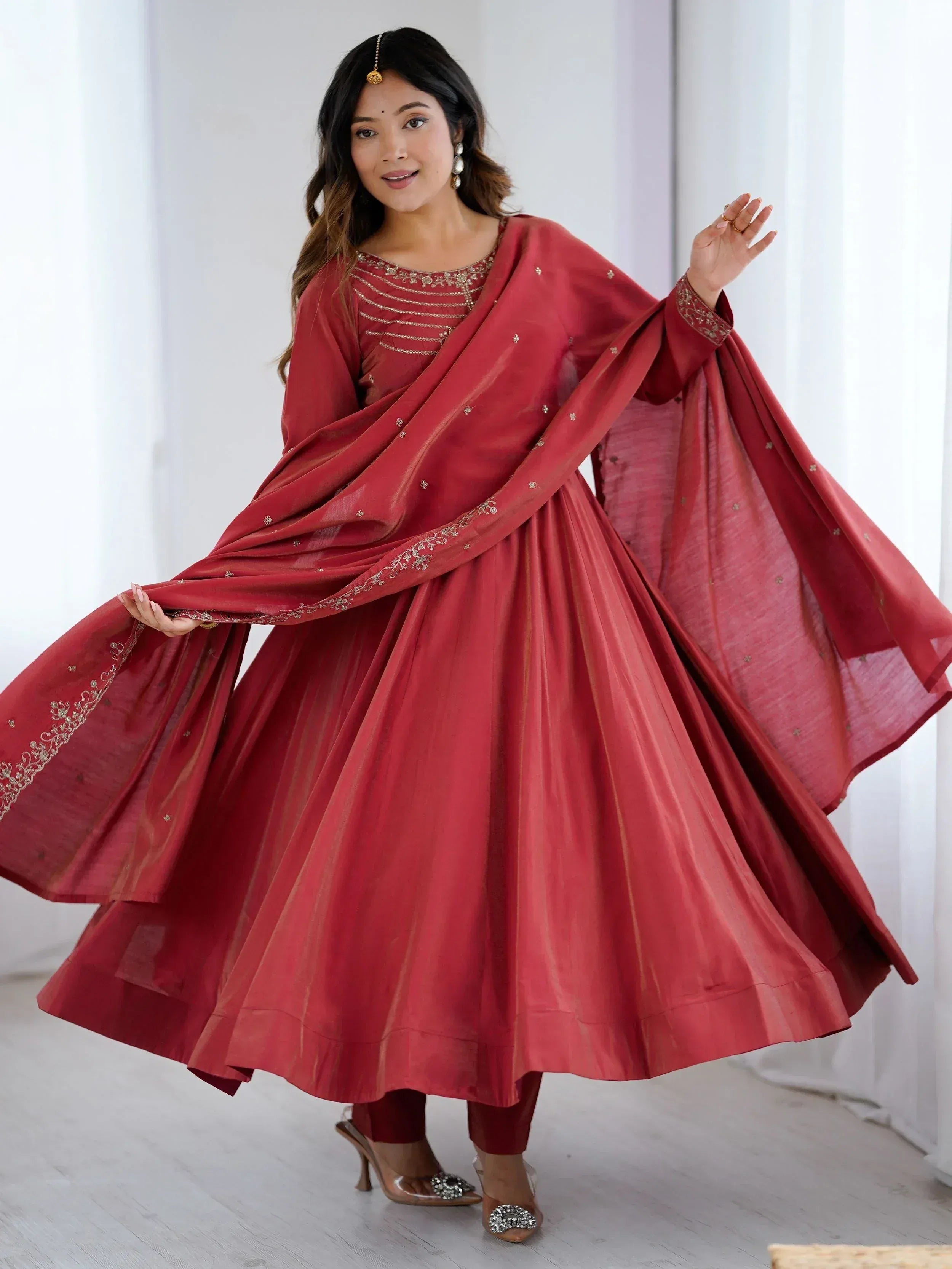 Red Indian ethnic anarkali suit with gold embroidery and dupatta, perfect for festive occasions