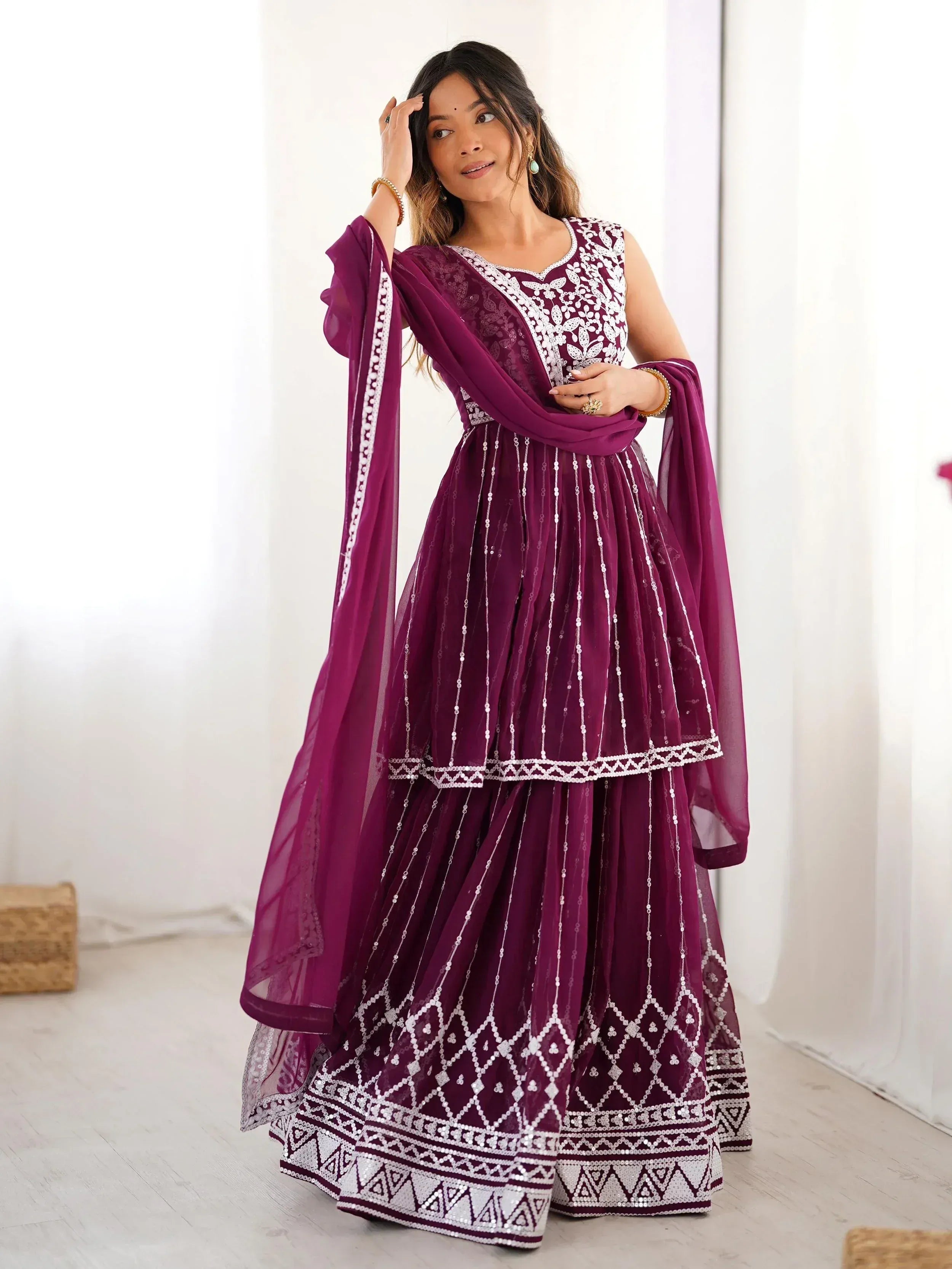 Purple embroidered Indian ethnic anarkali suit with sequin detailing and matching dupatta