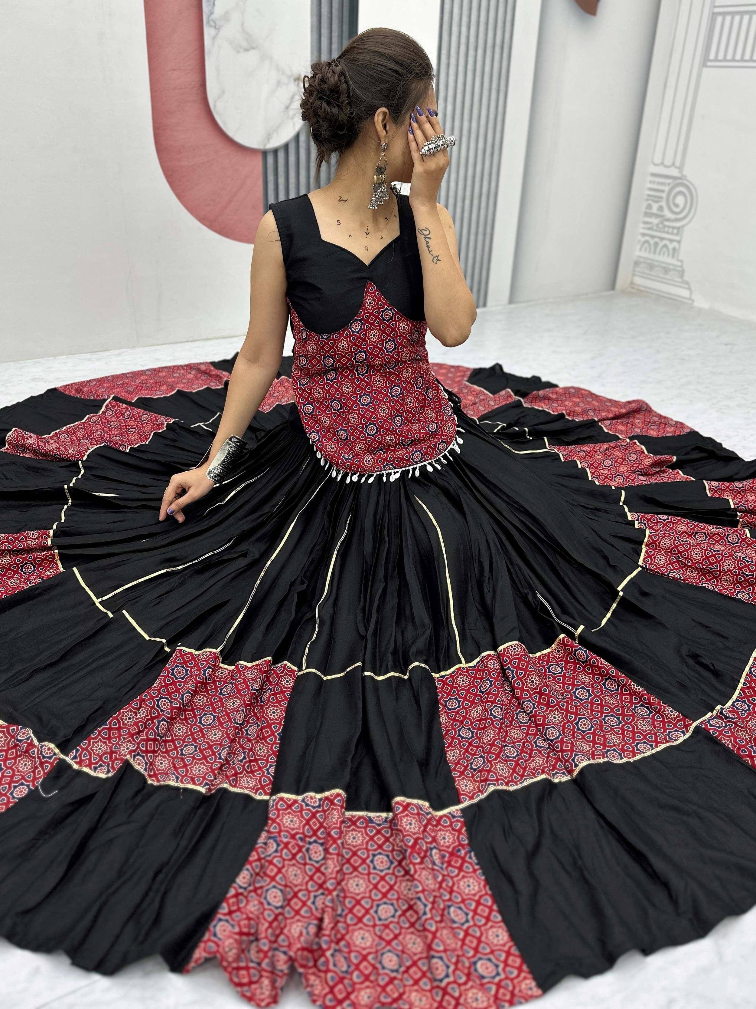 Black and red printed ethnic gown with flared skirt, perfect for Indian festive occasions