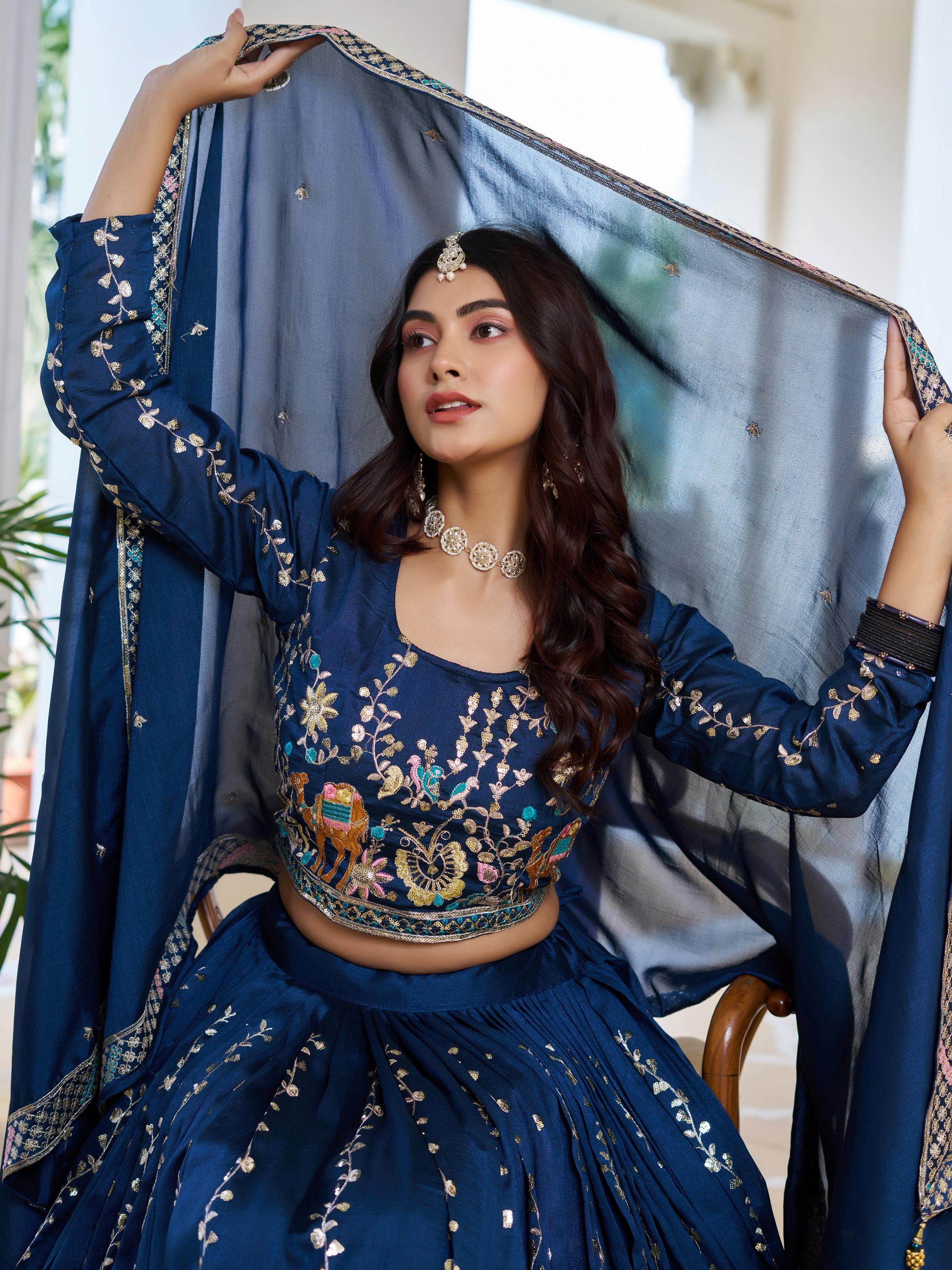 Charming Blue Embroidered Vichitra Silk Wedding Wear Lehenga Choli