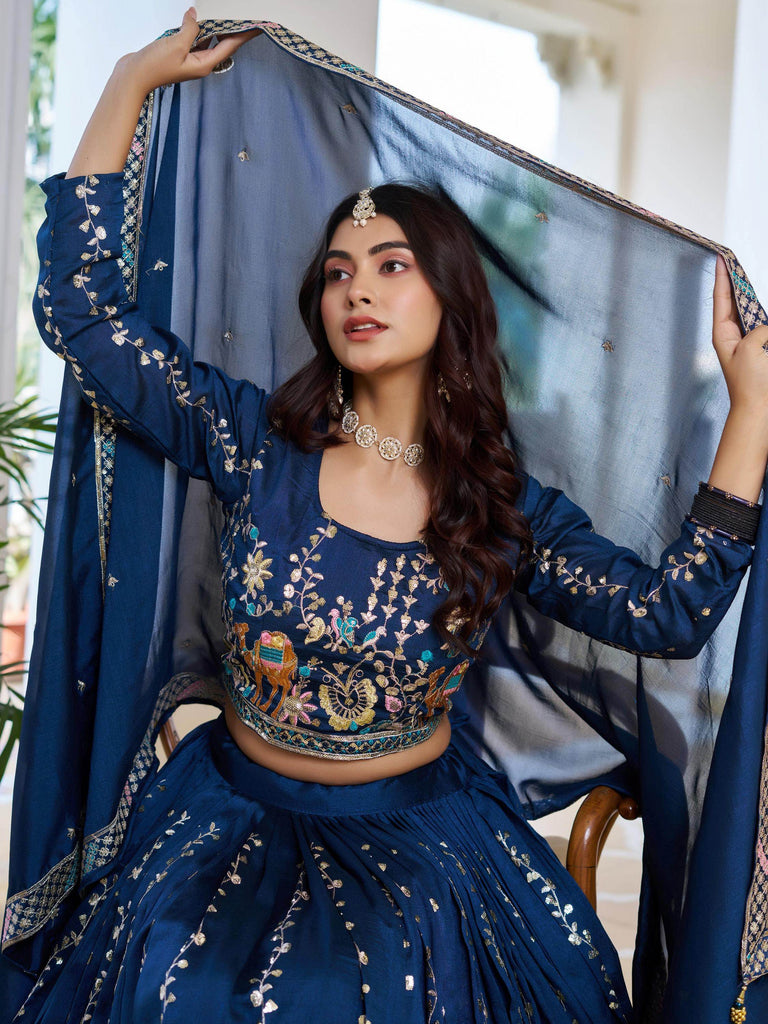 Charming Blue Embroidered Vichitra Silk Wedding Wear Lehenga Choli